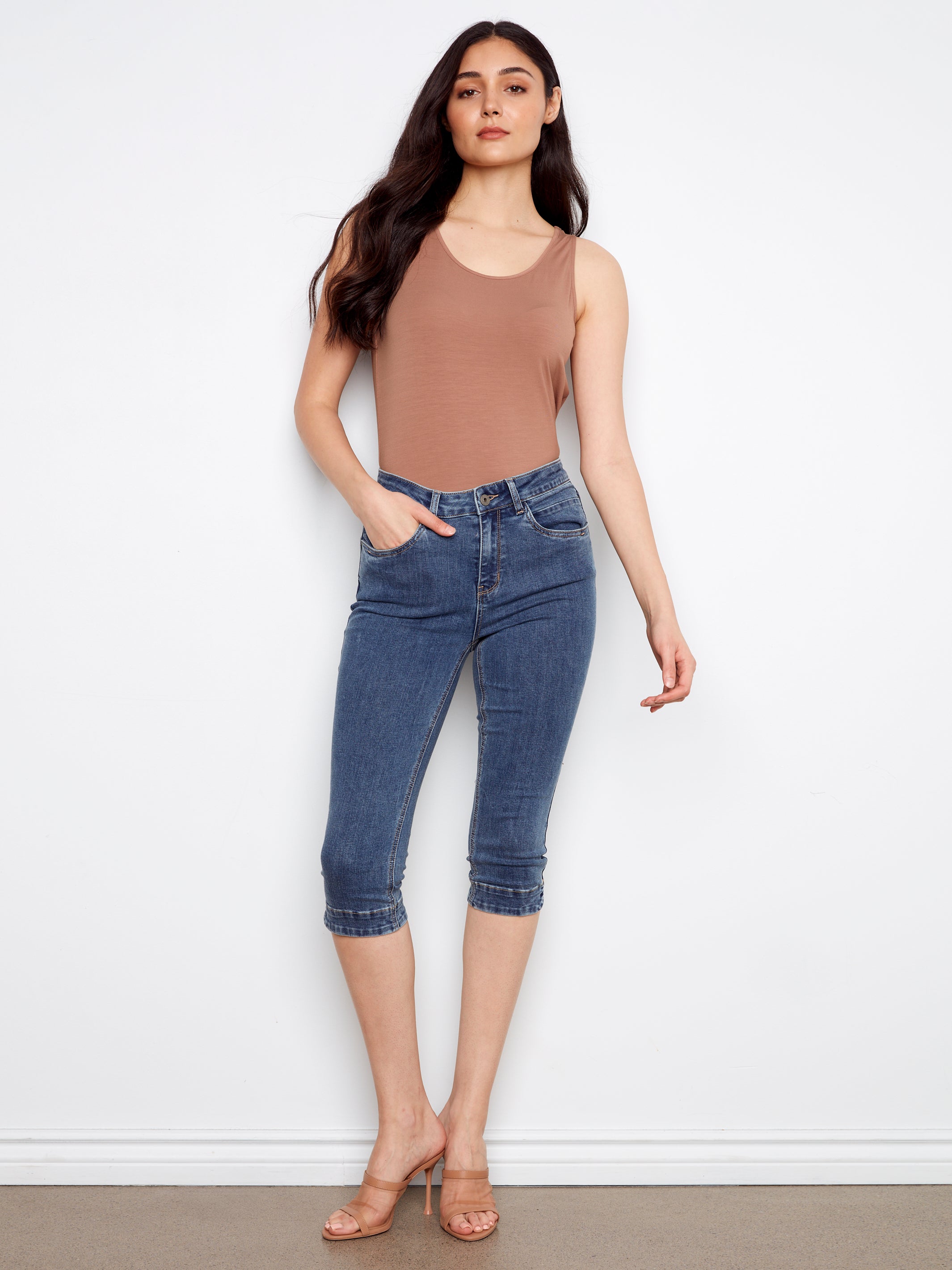 Slim fit blue denim with cropped length and ruched hems, Charlie B 19” Cropped Denim Capris by Charlie B.