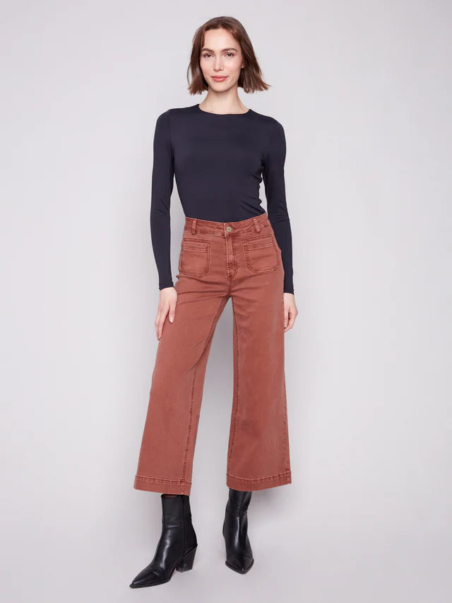 Charlie B Double Trouble 27” Wide Leg Pants in cognac color styled with a black fitted top and ankle boots by Charlie B