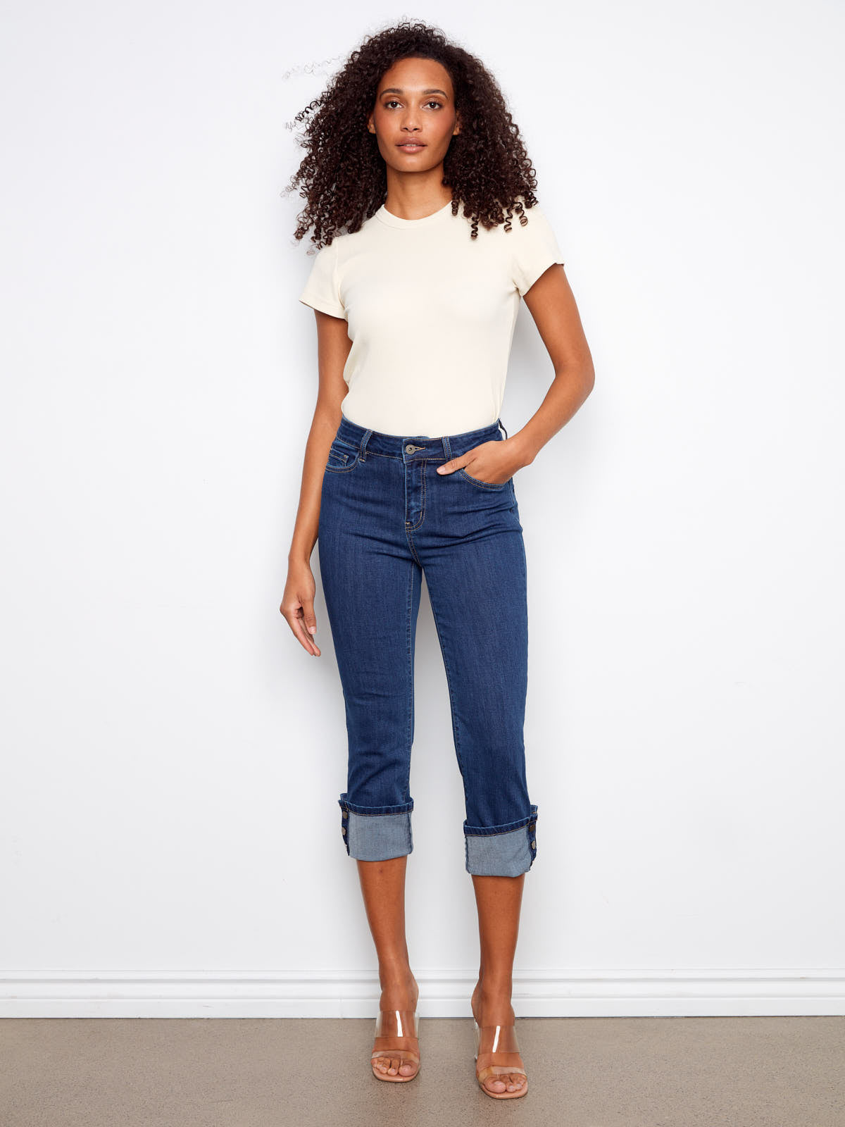 Model wearing Charlie B Up Down Snap 26” Cropped Denim Capris in indigo blue from Charlie B.