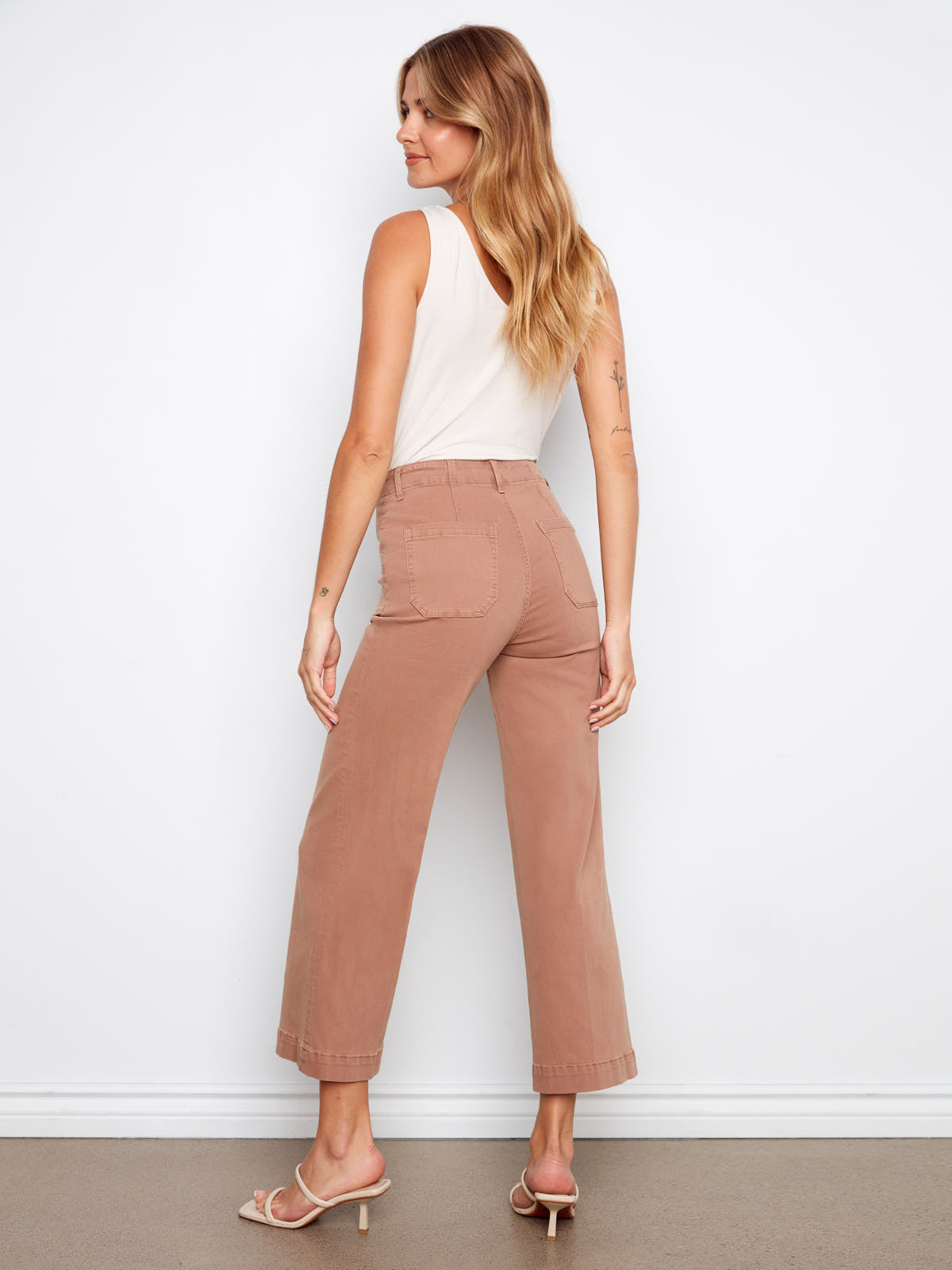 Charlie B Lola Double Pocket 27” Twill Wide Pants in tan styled with a white sleeveless top and sandals.