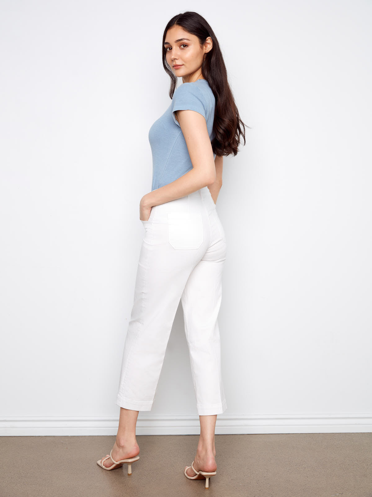 Charlie B Lola Double Pocket 27” Twill Wide Pants in white, styled with a light blue top and sandals.