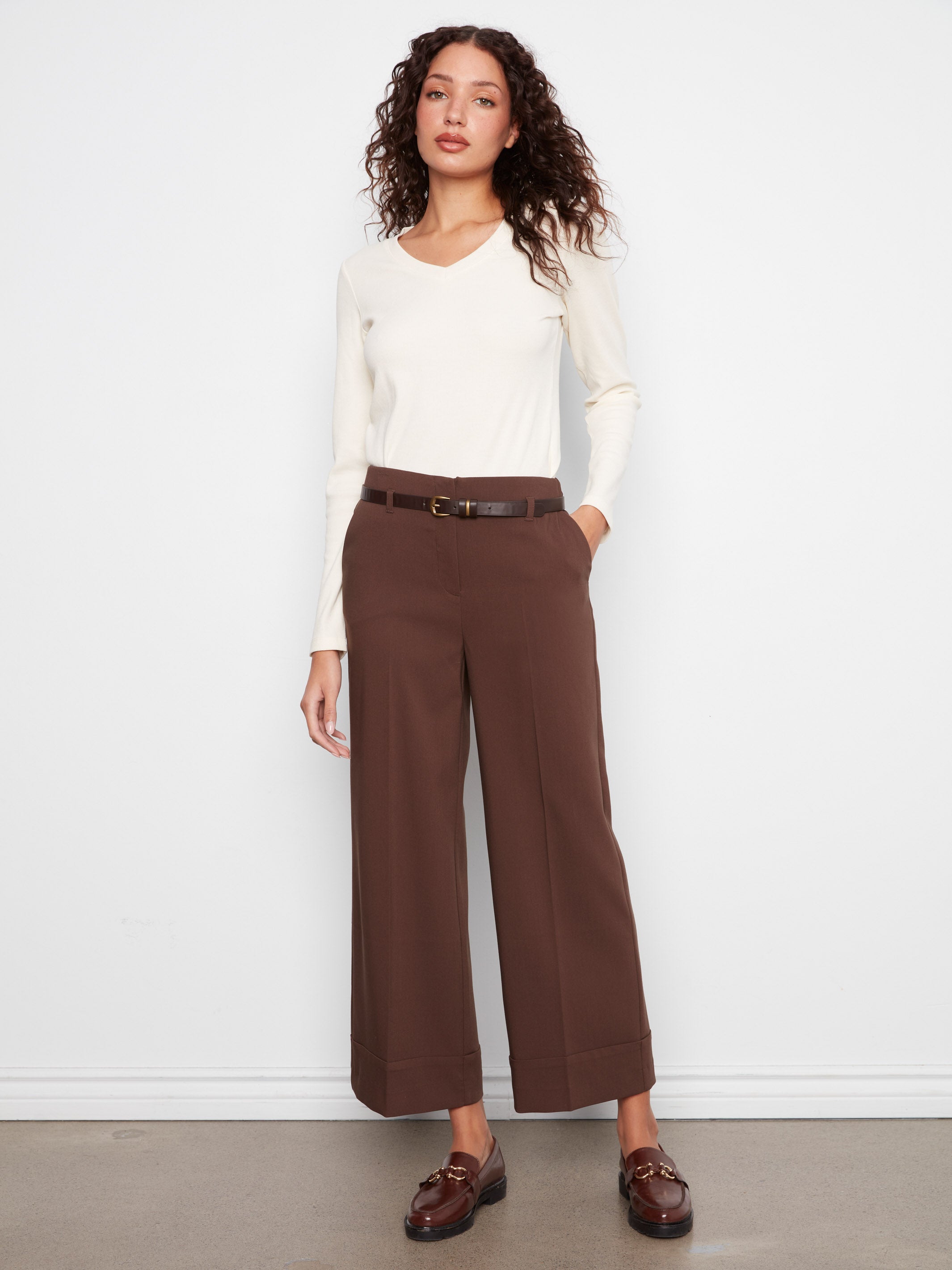 Slim fit white long sleeve top paired with Charlie B Dressy or Casual Cuff Belt 27" Pants by Charlie B in brown.