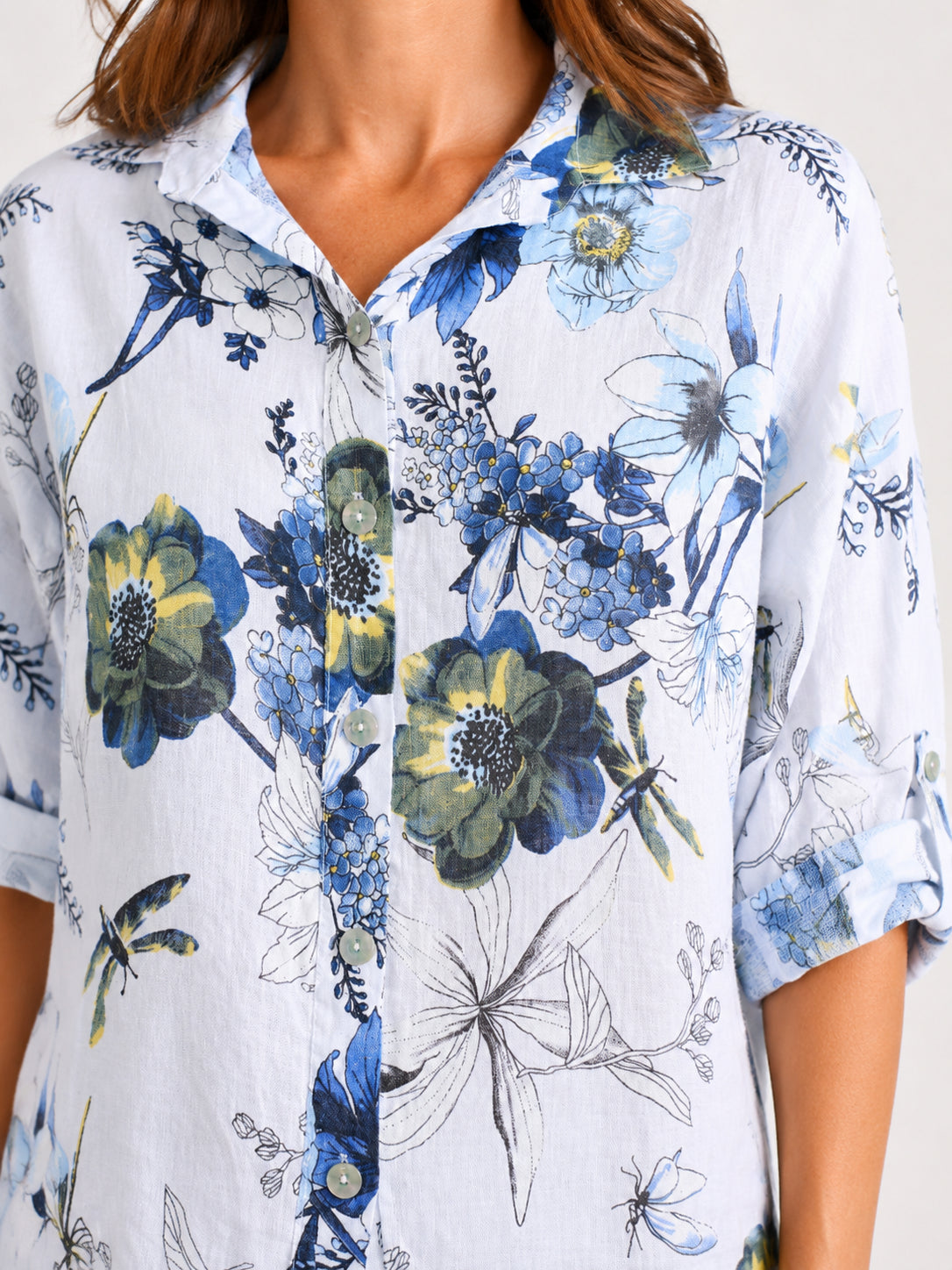 Fresh Flowers Linen Roll Sleeve Button Shirt by Cherishh in white with blue and green floral print, roll-up sleeves, and buttons.