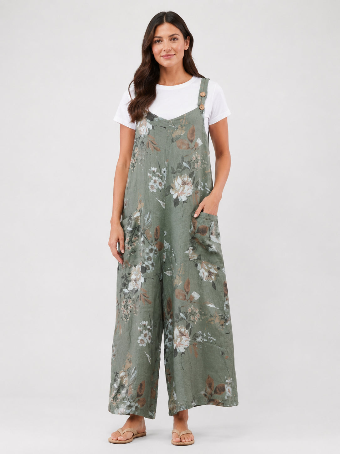 So Easy Printed Wide Leg Linen Jumpsuit in olive floral pattern by Cherishh paired with white top and sandals.