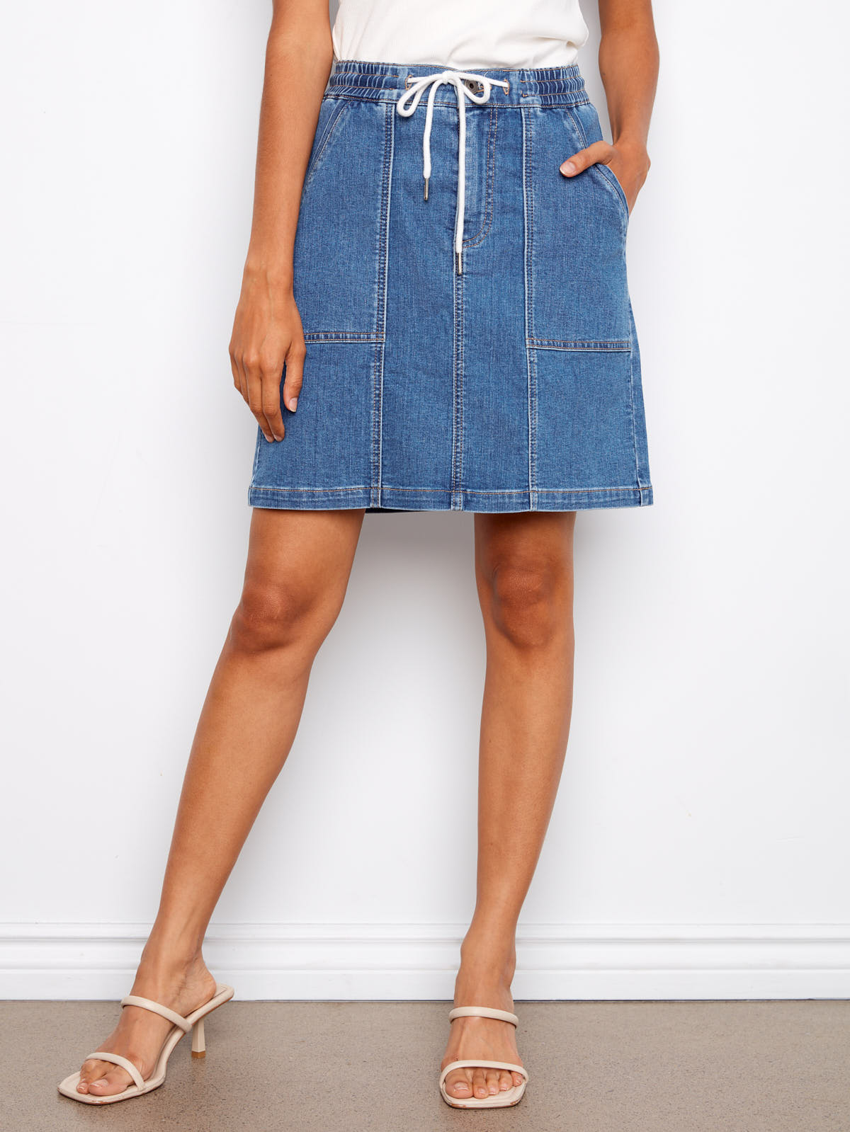 Charlie B Nautical Tie Waist Denim Skirt in blue denim with front pockets and a white drawstring belt by Charlie B.