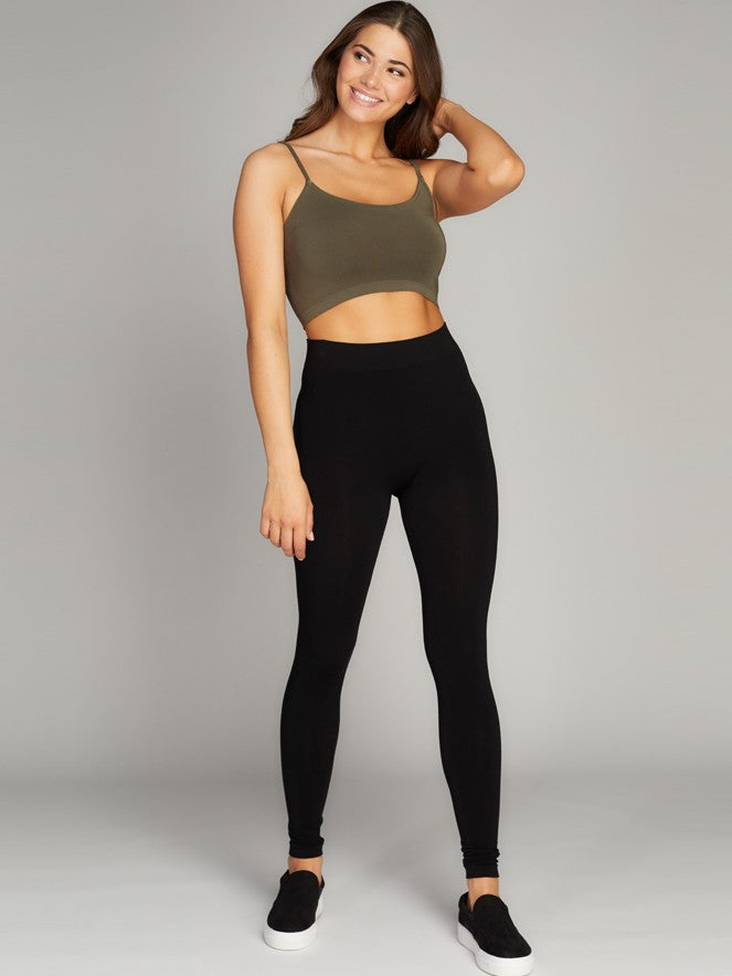 Black Fleece Lined Bamboo Leggings by Coast To Coast Trading styled with casual olive green crop top and black slip-on shoes.