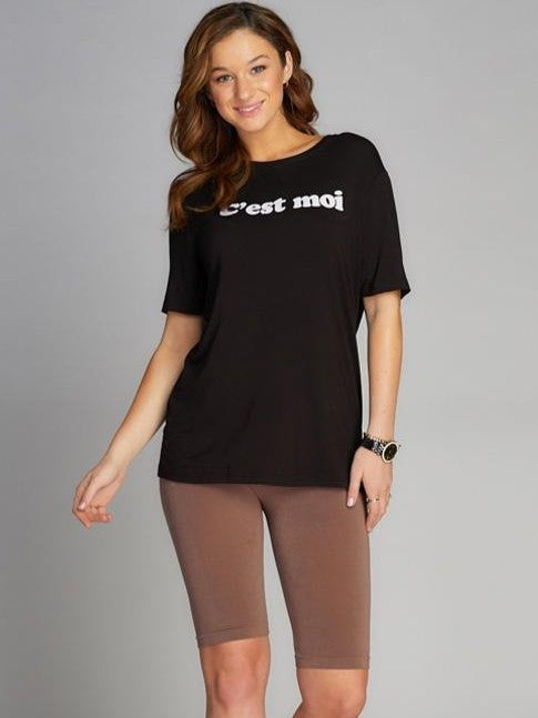 Mocha colored High Waist Bamboo Biker Shorts by Coast To Coast Trading styled with a black graphic tee.