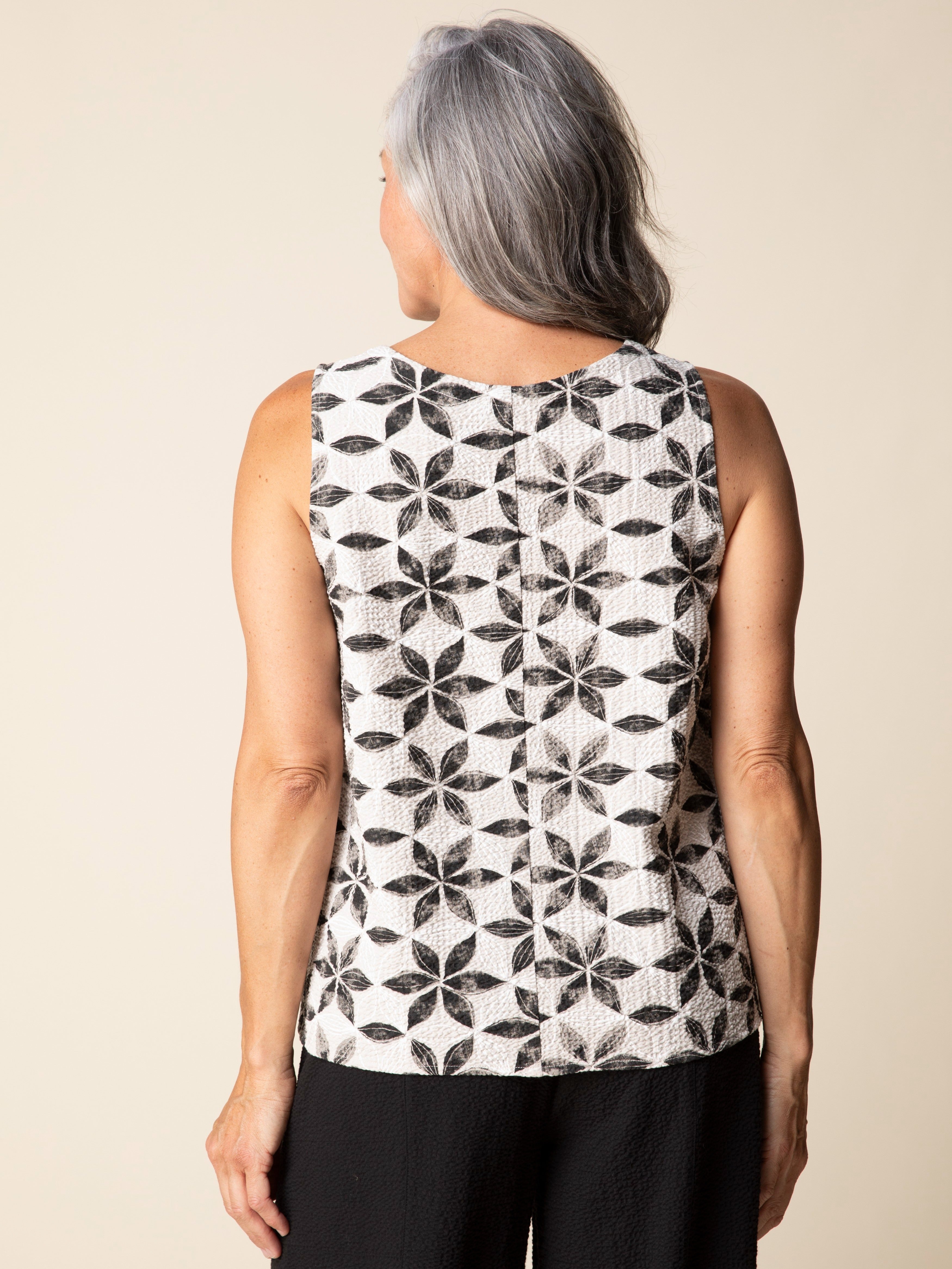 Back view of beige and black floral sleeveless top in crinkle fabric, Habitat Amalfi Floral Crinkle Pocket Sleeveless Top