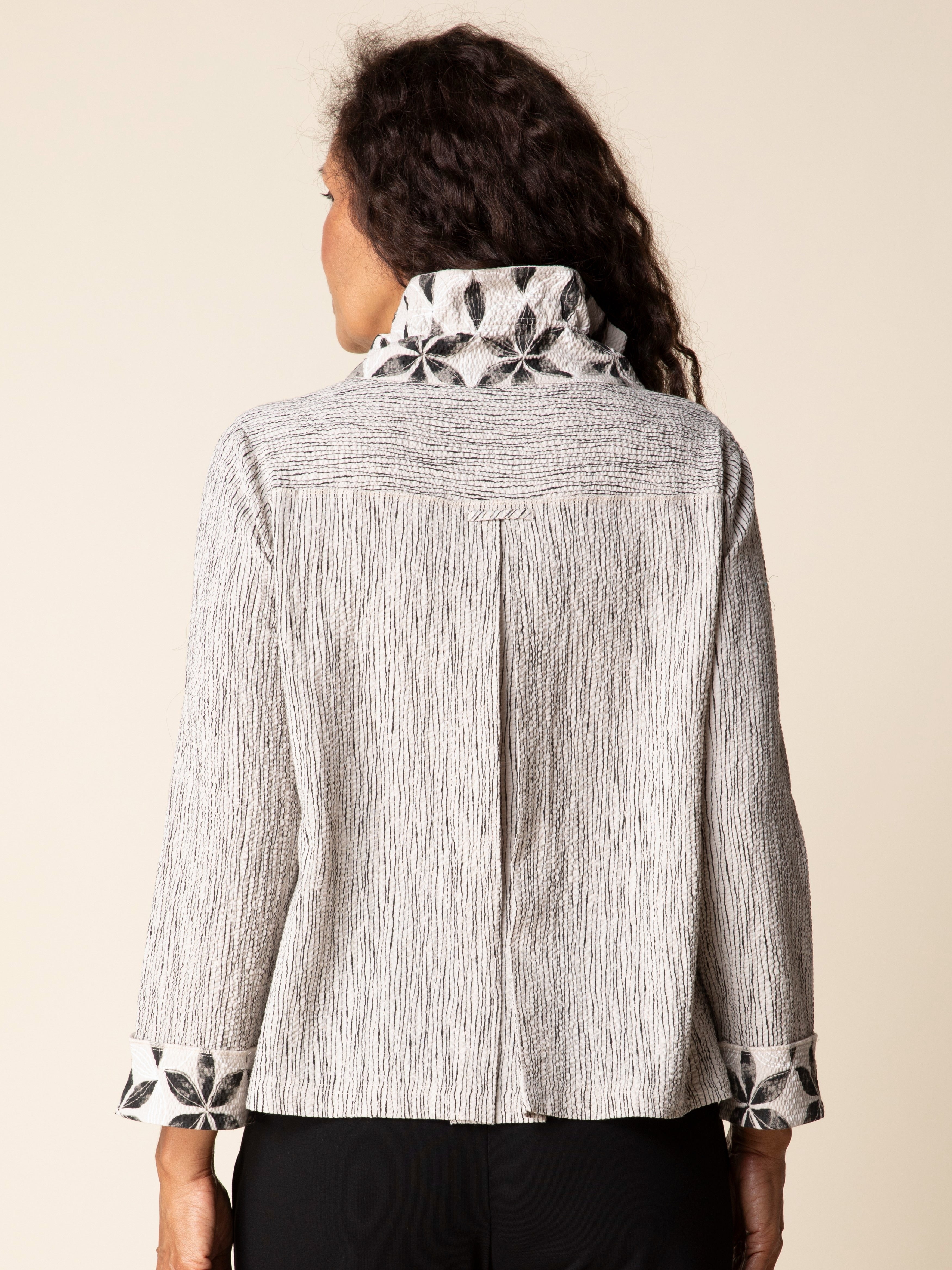 Back view of Habitat Luna Amalfi Floral Crinkle Button-Front Blazer in beige with floral cuff and collar details by Habitat.