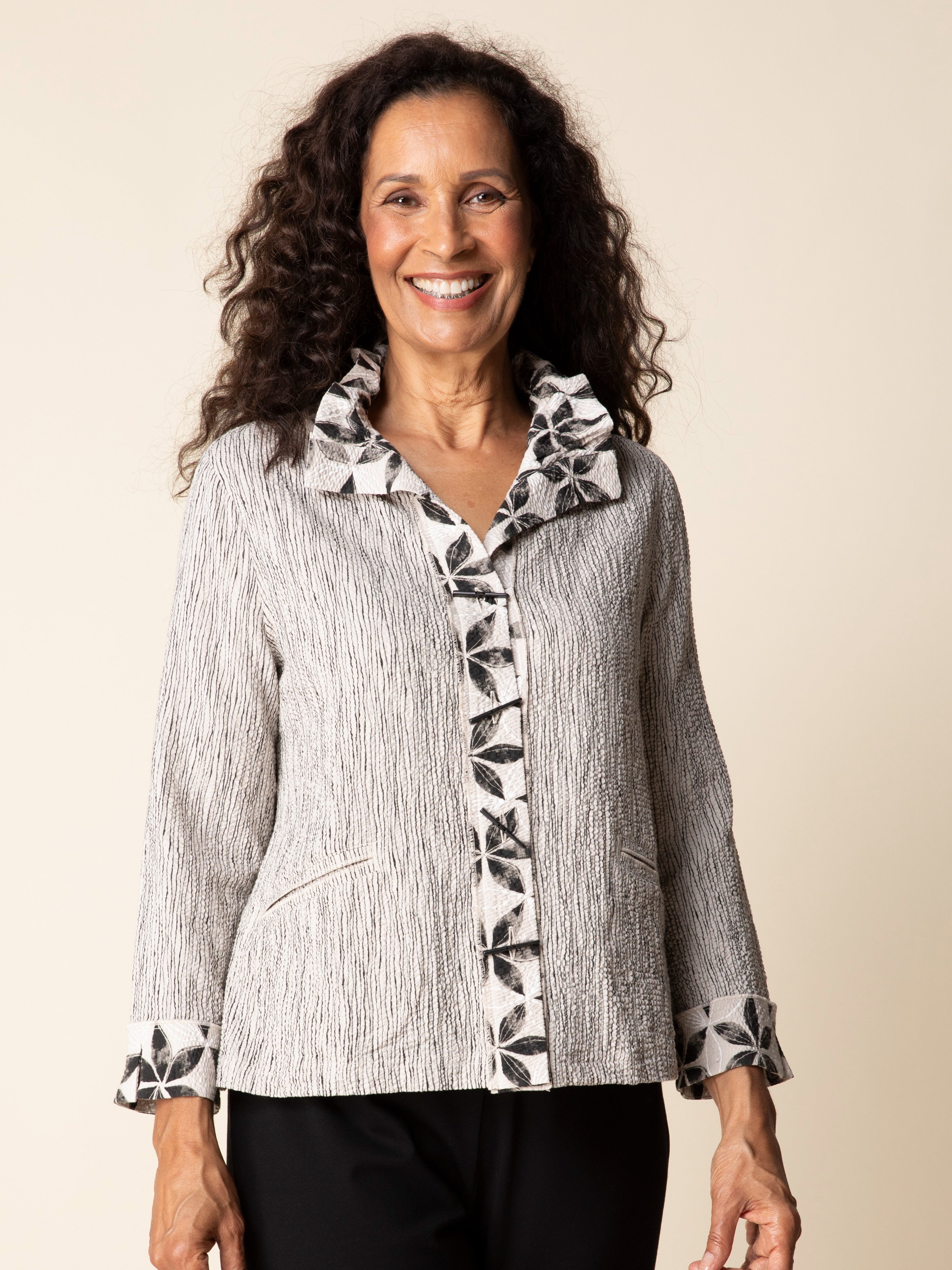 Habitat Luna Amalfi Floral Crinkle Button-Front Blazer in beige with floral trim, a stylish outerwear jacket by Habitat.
