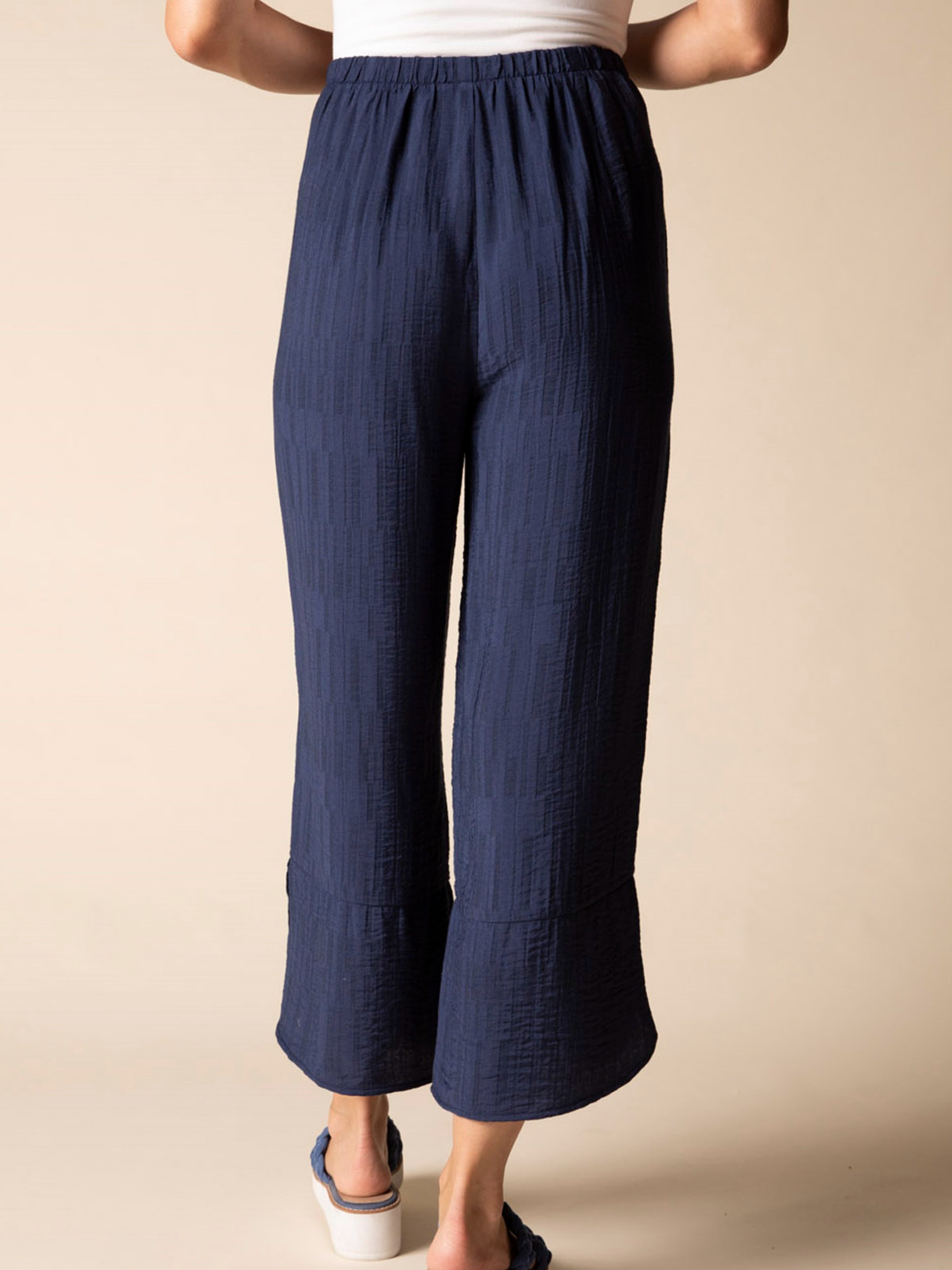 Habitat Wide-Leg Soft Jacquard 25" Button Crop Pants in navy with textured fabric and elastic waistband