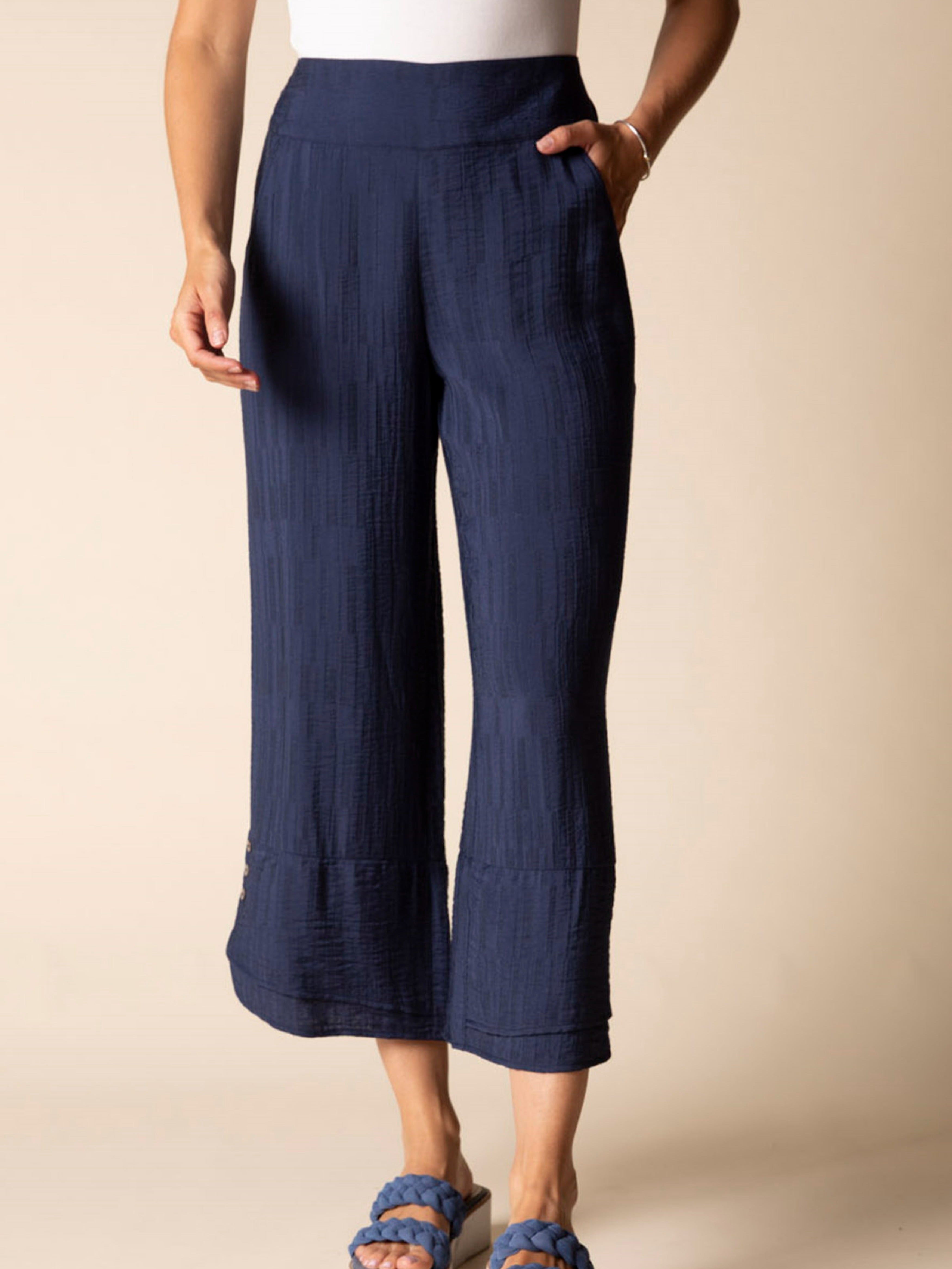 Habitat Wide-Leg Soft Jacquard 25" Button Crop Pants in navy with textured fabric and button accents near the hem