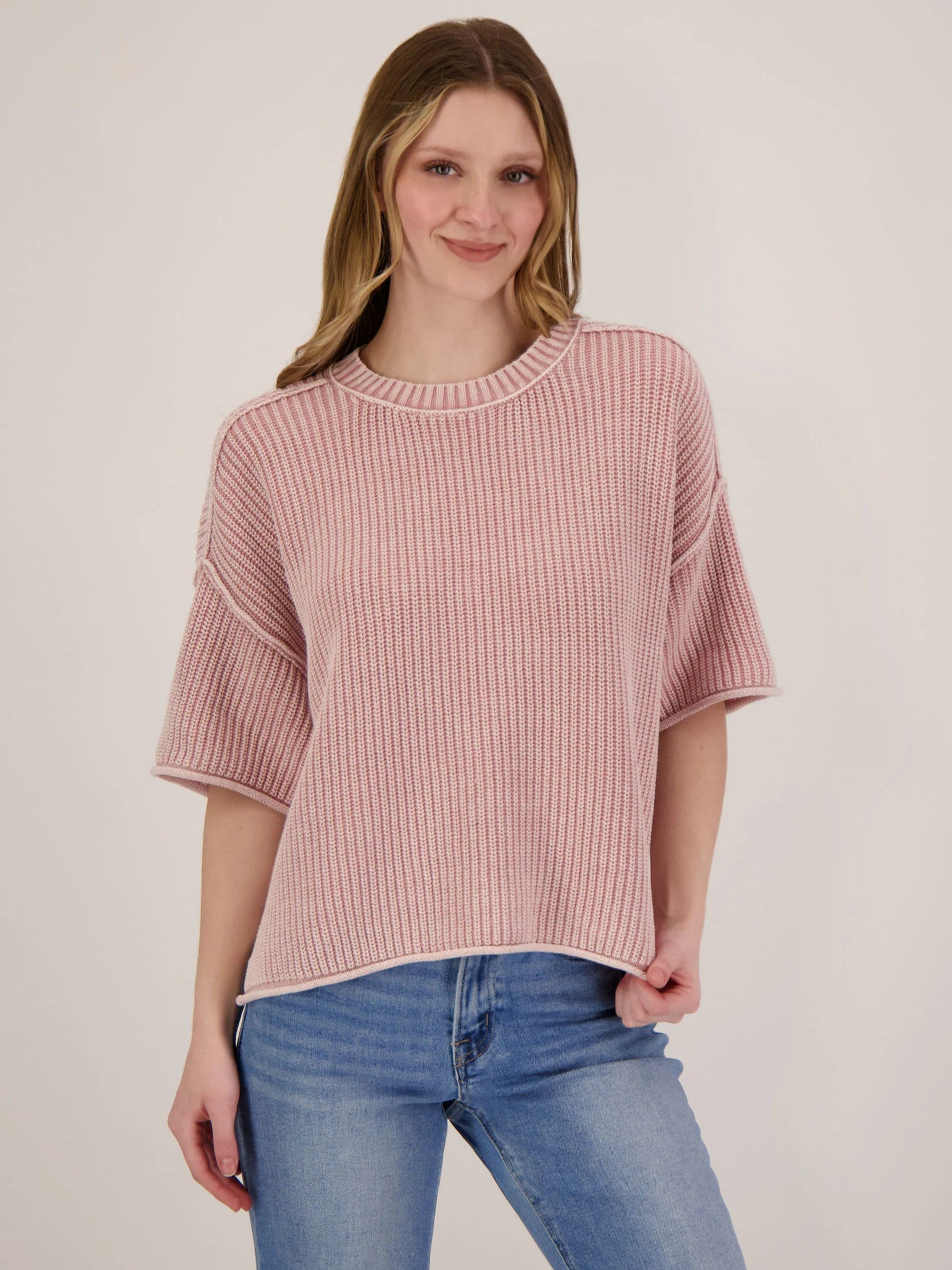 Washed Raw Edge Short Sleeve Crew Top in soft pink knit by Mine styled with casual light blue denim jeans