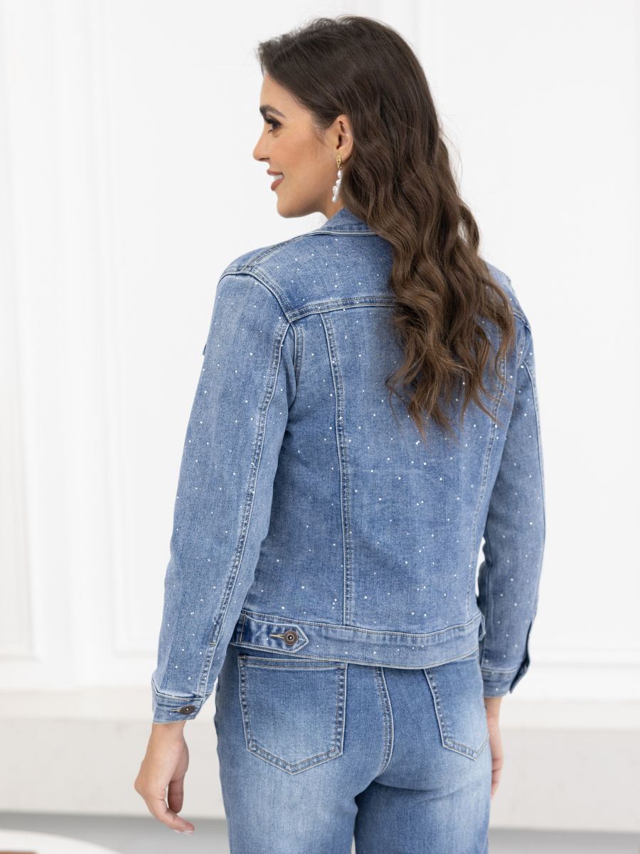 Light blue denim jacket with silver stud detailing paired with matching jeans on a white background.