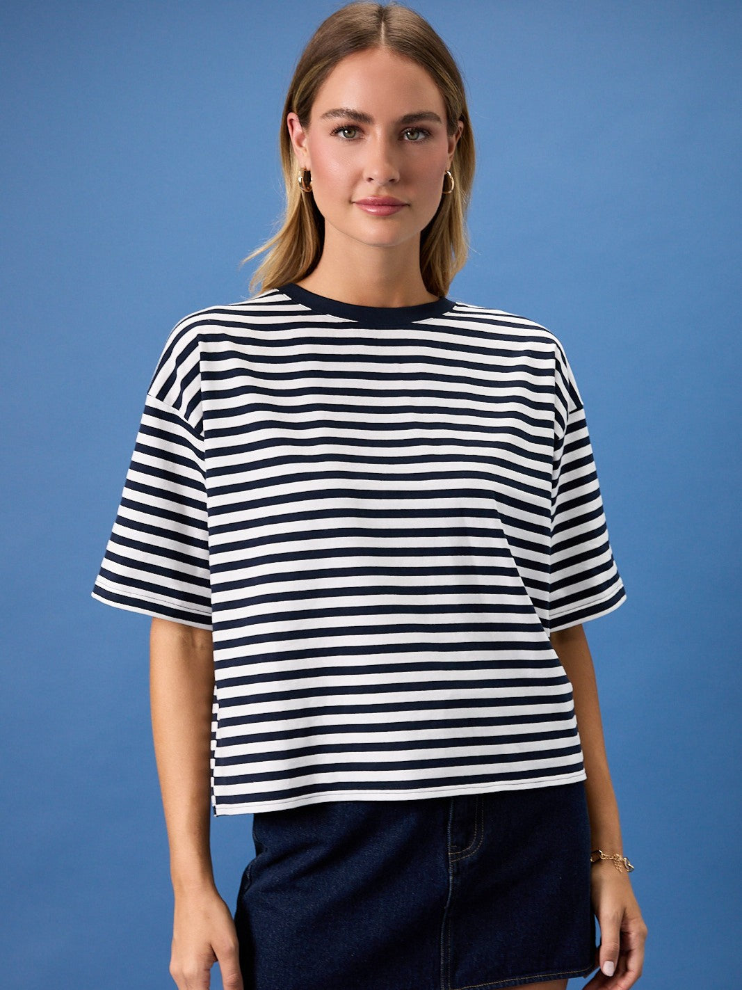 Striped Tie Back Short Sleeve Top by Gilli in navy and white stripes, short sleeves, paired with dark denim skirt.