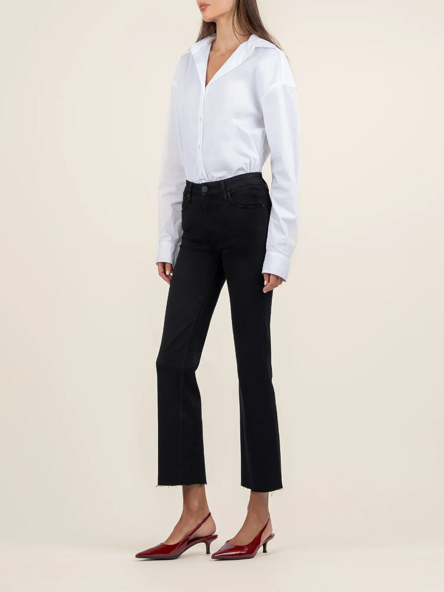 Black denim Kut from the Kloth Kelsey Mid Rise Flare Jeans styled with a white button-down shirt and red heels