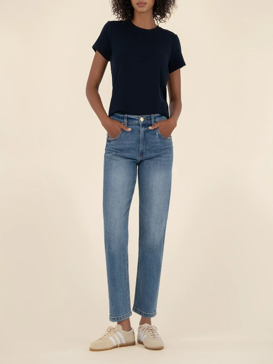 Light wash denim Kut from the Kloth Kit High Rise Straight Leg Jeans styled with a black tee and casual sneakers