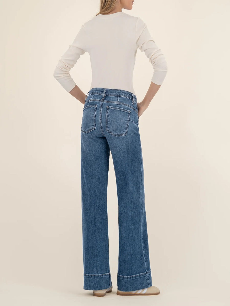 Back view of Kut from the Kloth Maya High Rise 31” Wide Leg Trousers in medium blue denim on model.