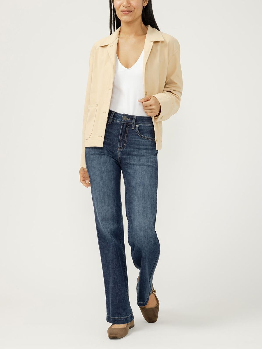 Blue denim Silver Avery 10.25" Curvy 31" Trouser styled with beige jacket and white top by Silver.