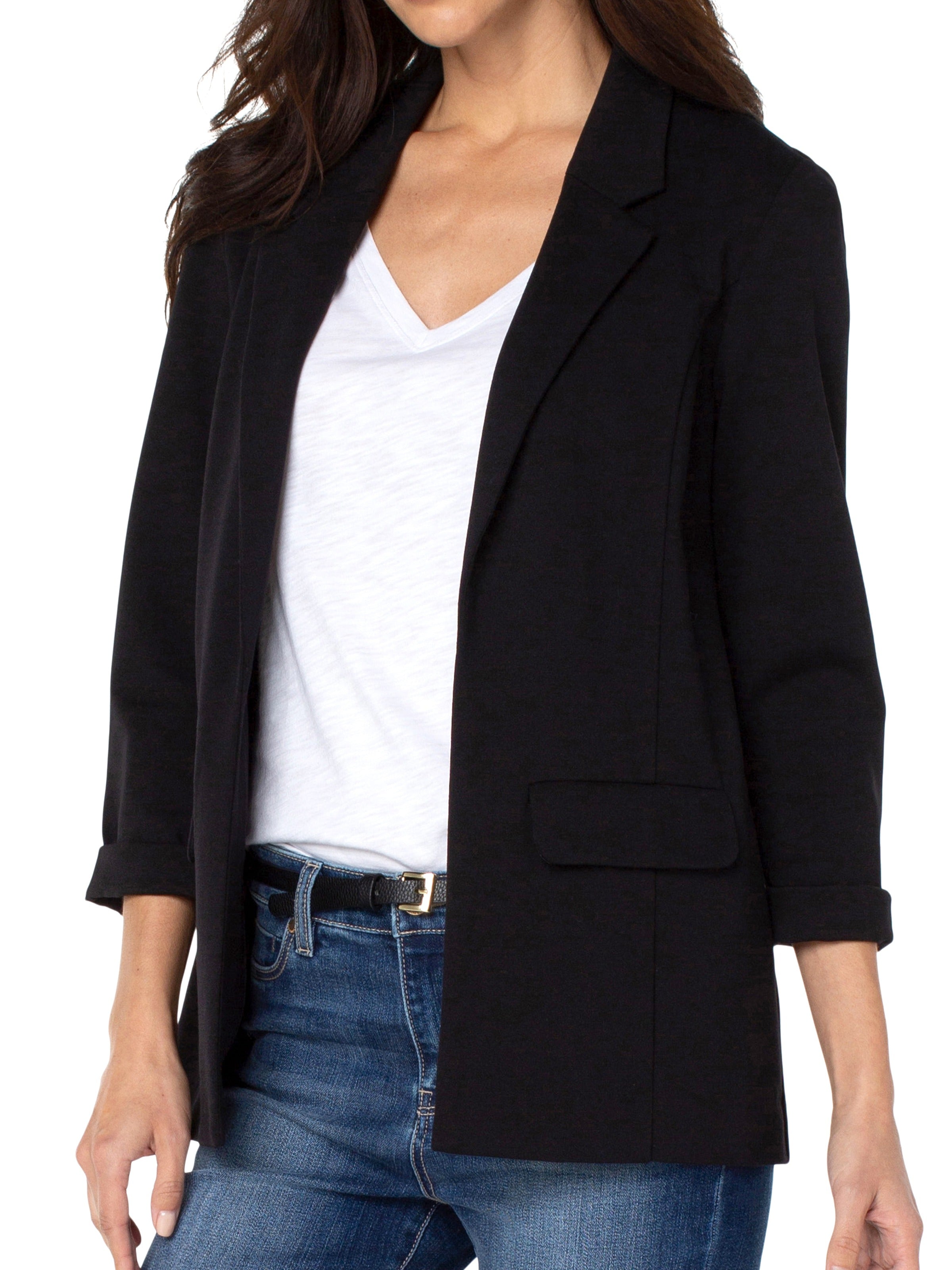 Black Liverpool Solid Boyfriend Blazer styled with casual white top and denim jeans, featuring rolled sleeves and front pockets.