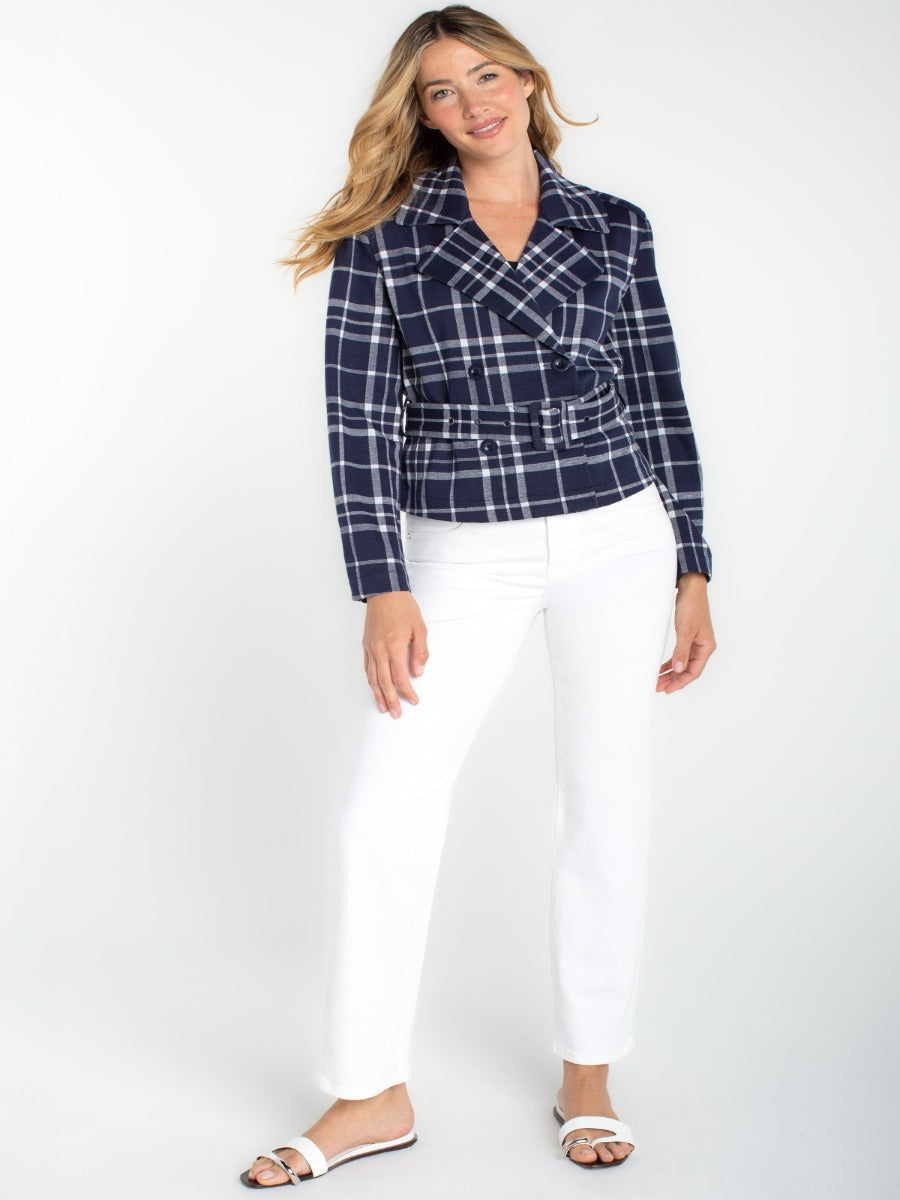 Liverpool Checkered Short Jacket in navy plaid with belted waist styling paired with white pants and sandals.