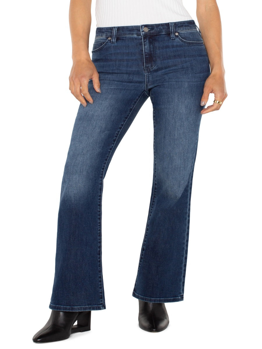 Liverpool Lucy 32” Bootcut Denim Jeans by Liverpool in dark wash denim paired with black ankle boots and white top