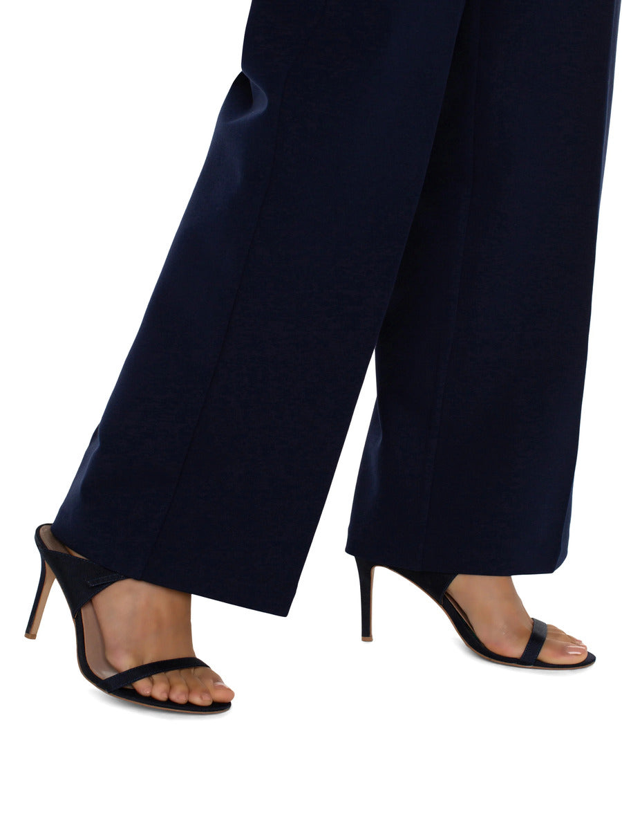 Close-up of navy Liverpool Kelsey 31” Wide Leg Trouser paired with black high-heeled sandals by Liverpool
