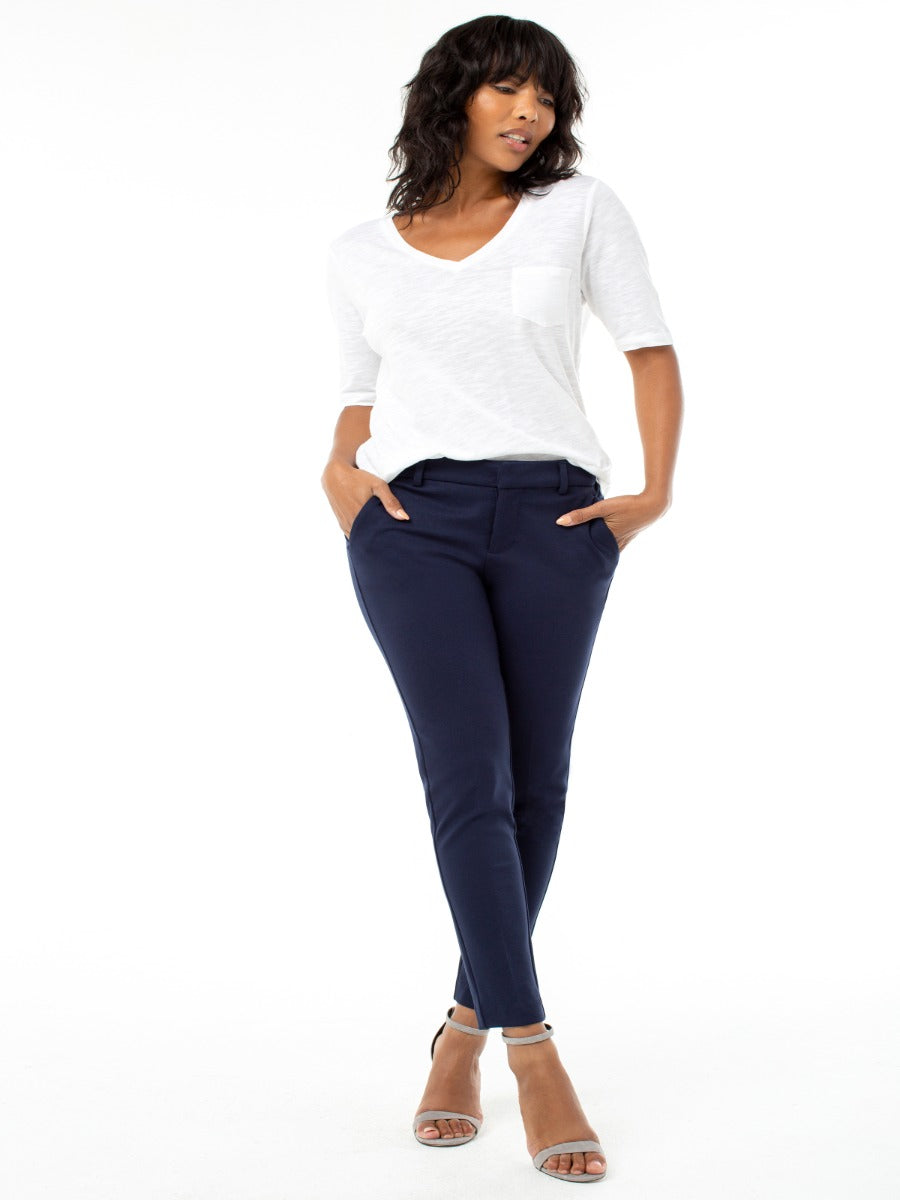 Navy slim fit pants styled with a casual white top, featuring Liverpool Kelsey Solid 29” Pant by Liverpool.