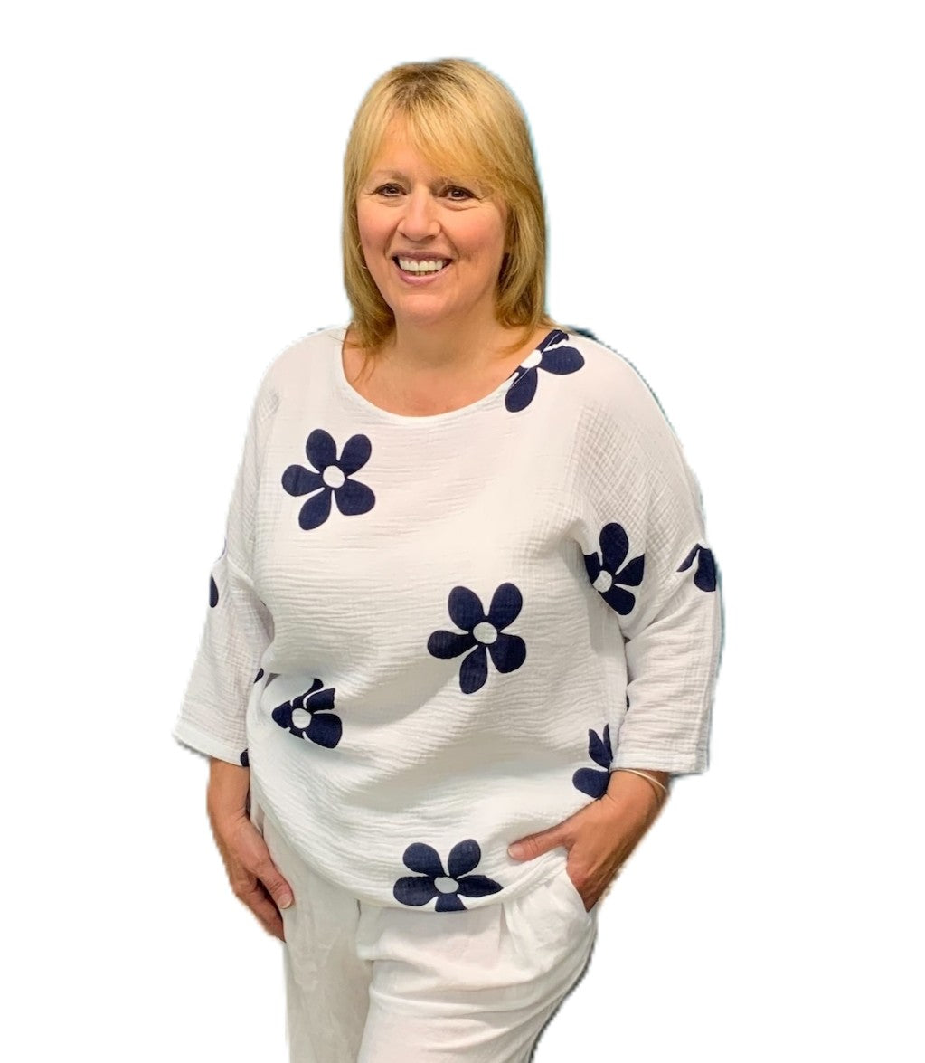 Daisy Print Oversized Cotton Long Sleeve Top by Plum Loco in white with bold navy floral print and relaxed fit.