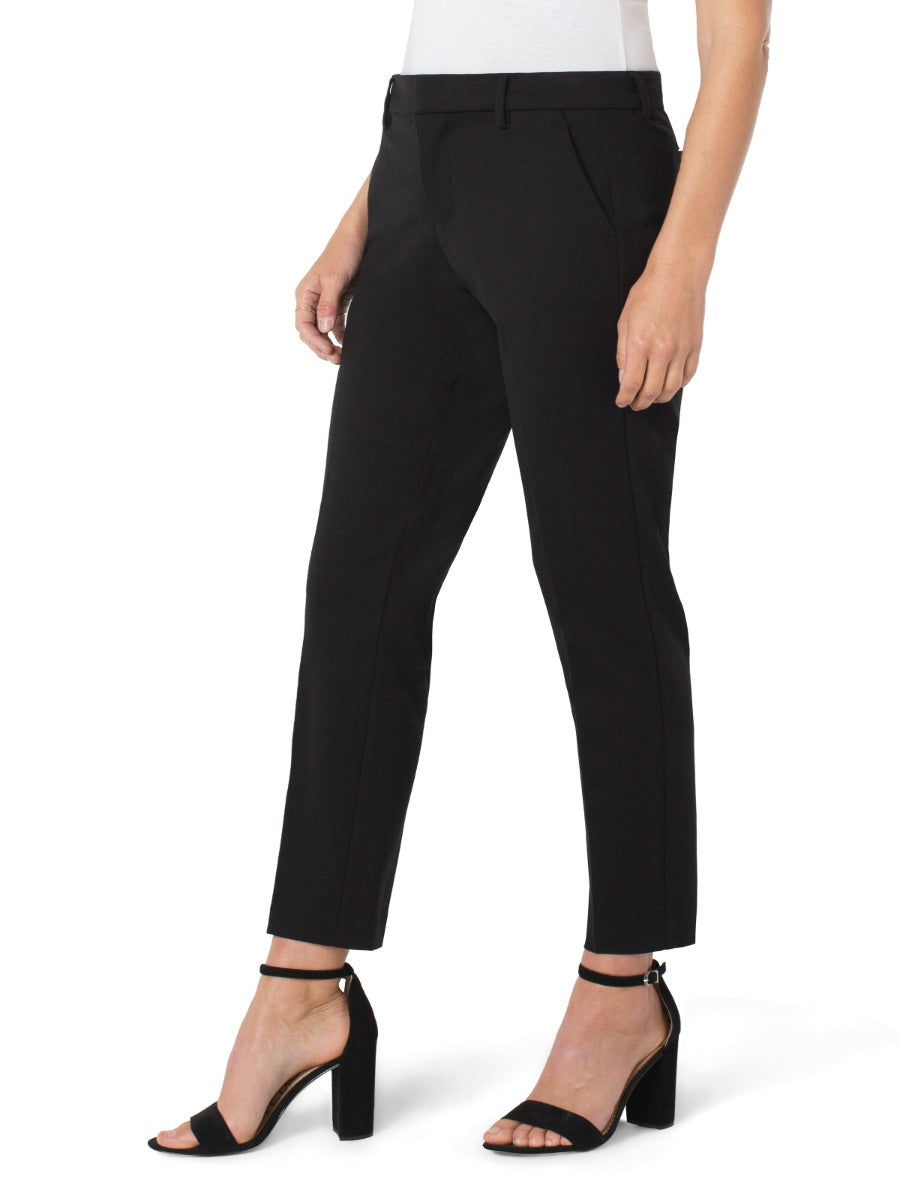 Liverpool Petite Kelsey 27” Solid Pant in black styled with black heeled sandals, pairing classic and modern fashion.