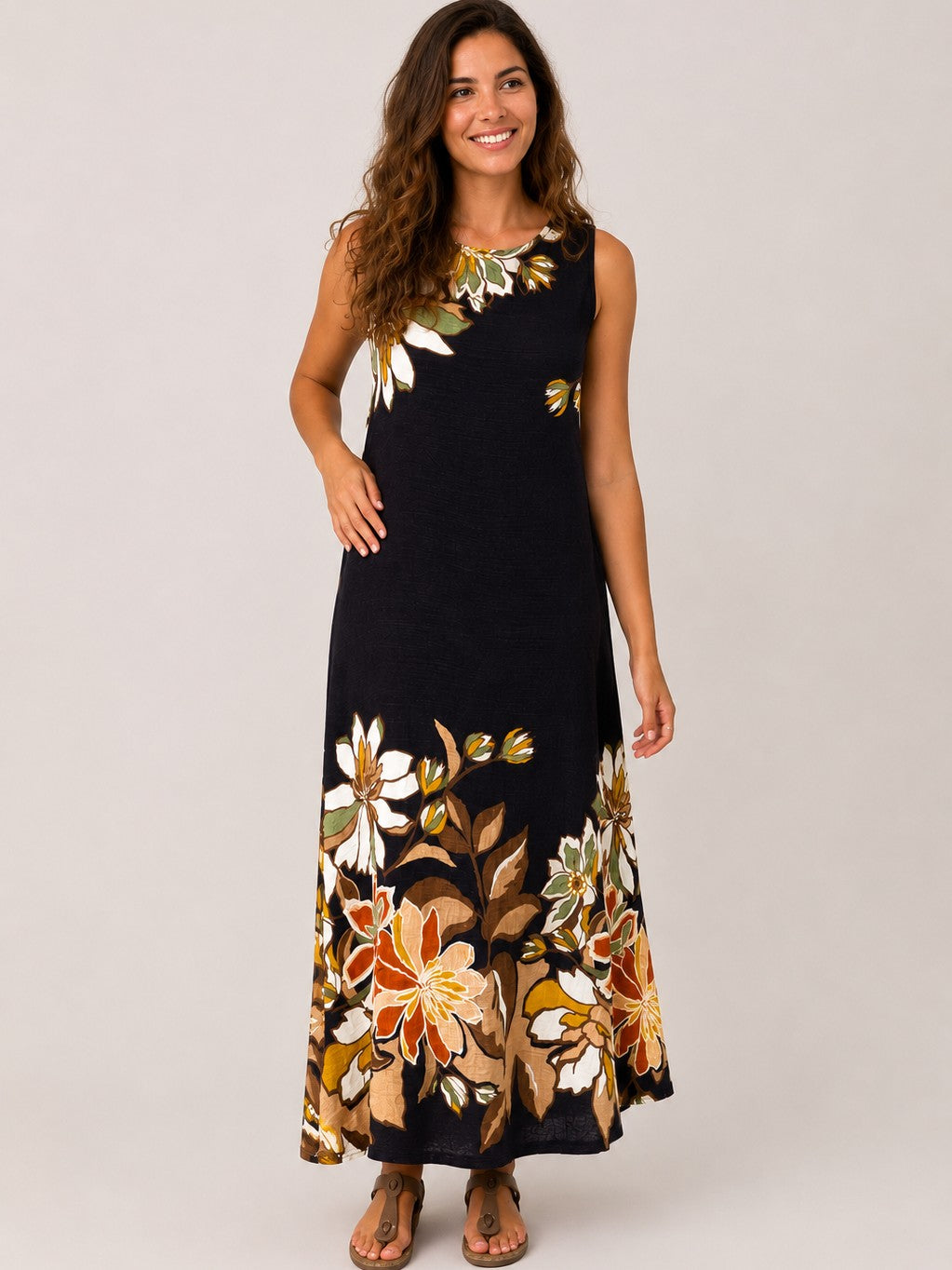 Feel Good Floral Sleeveless Maxi Dress for Women by Plum Loco, black with large floral print and sleeveless design.