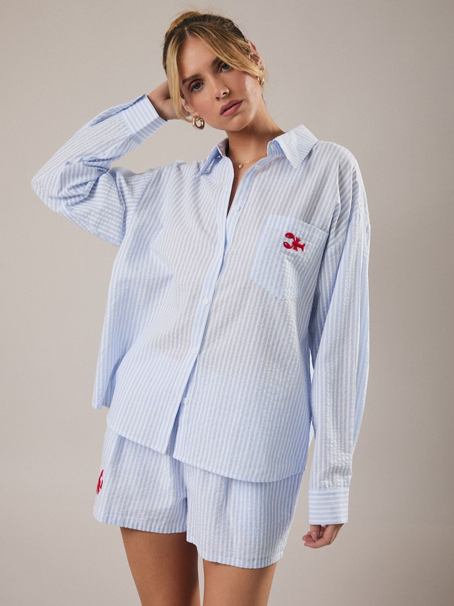 Gilli Lobster Cotton Stripe Shirt in light blue with white vertical stripes and embroidered red lobster logo on the chest pocket