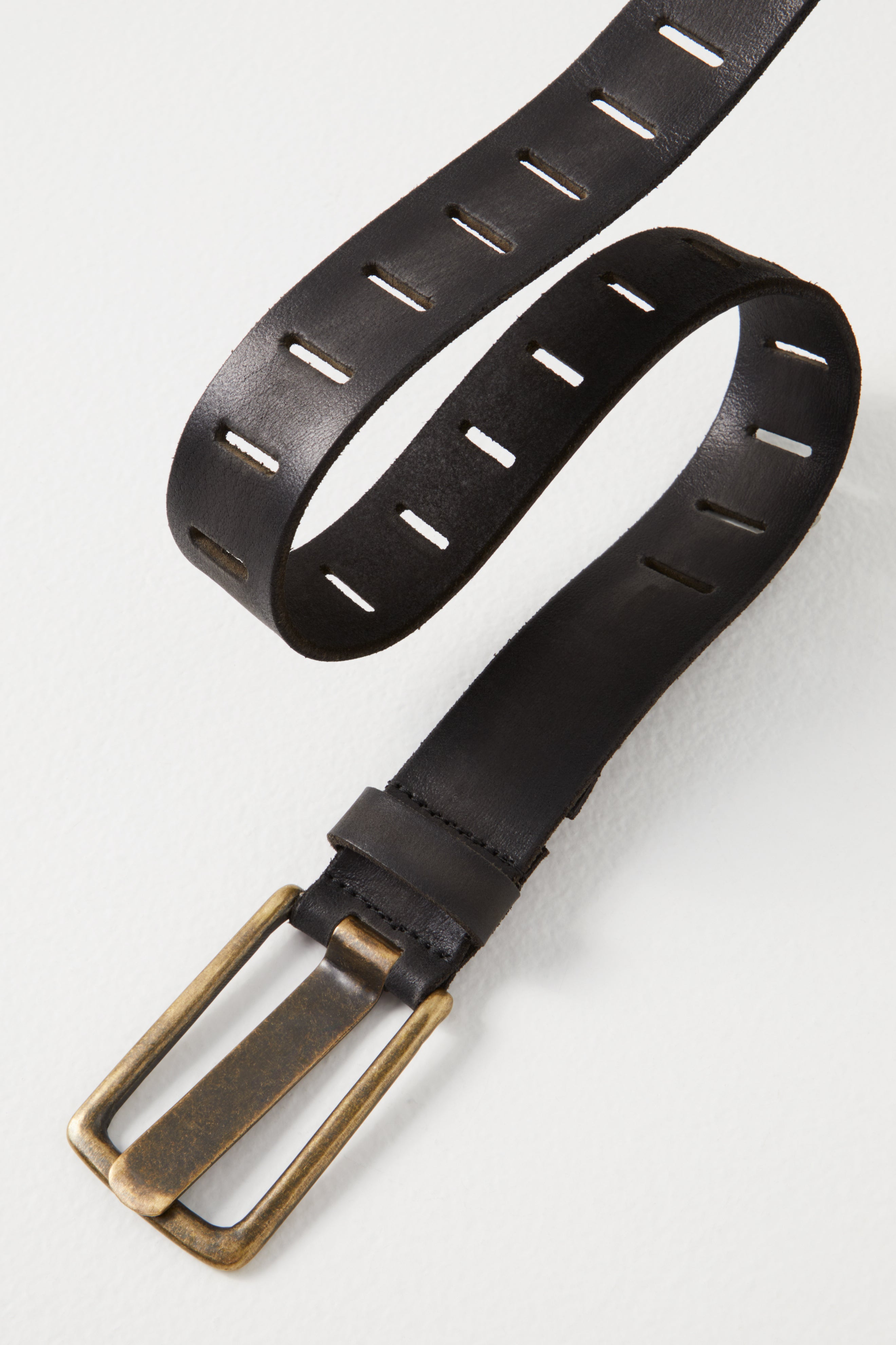 Free People Jona Belt in black leather with vintage brass buckle, an essential accessory from Free People.