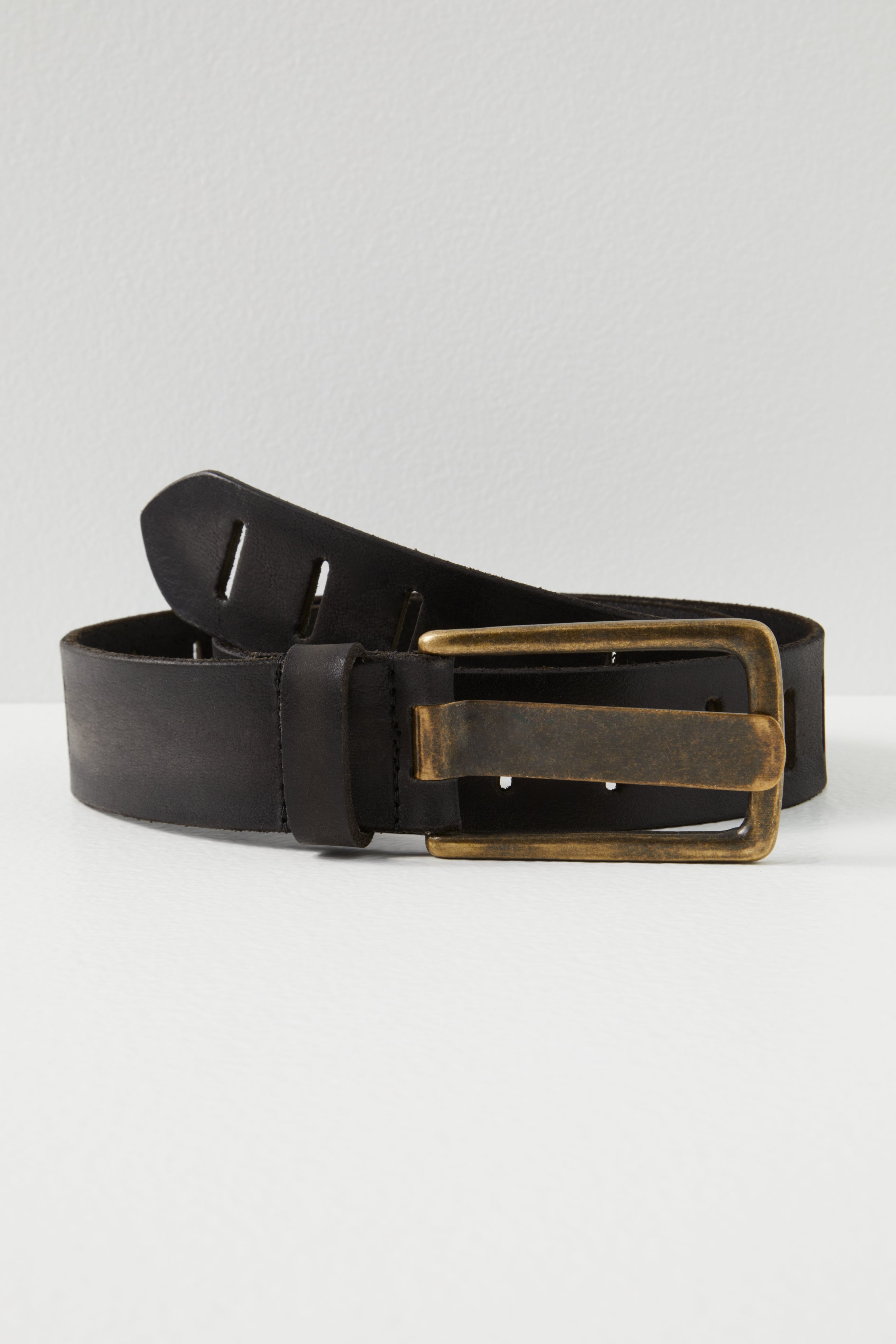 Free People Jona Belt in black leather with an antique brass buckle, stylish accessory by Free People.