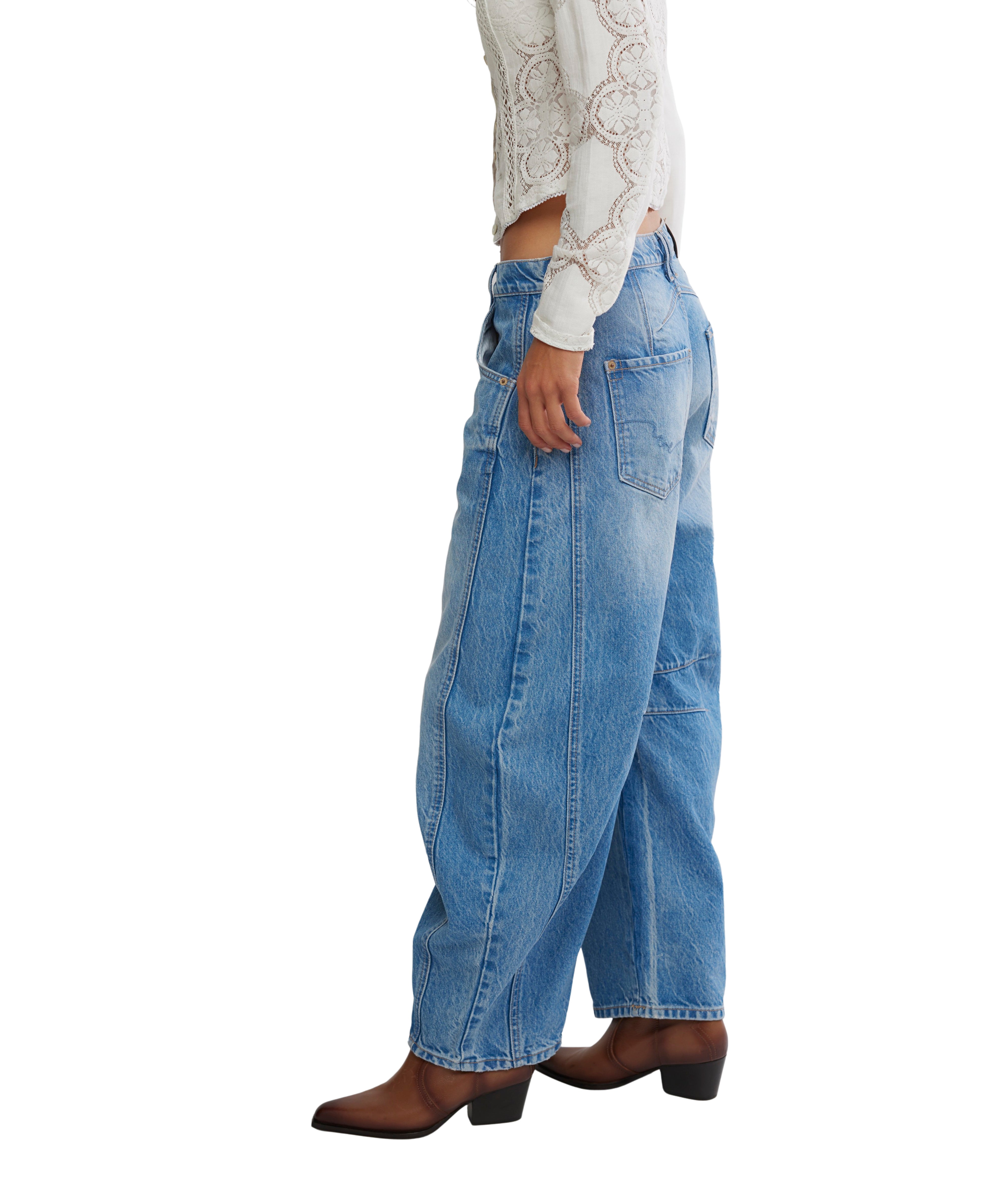 Free People Good Luck Maker Barrel Denim Jeans in light blue styled with brown ankle boots and lace long sleeve top