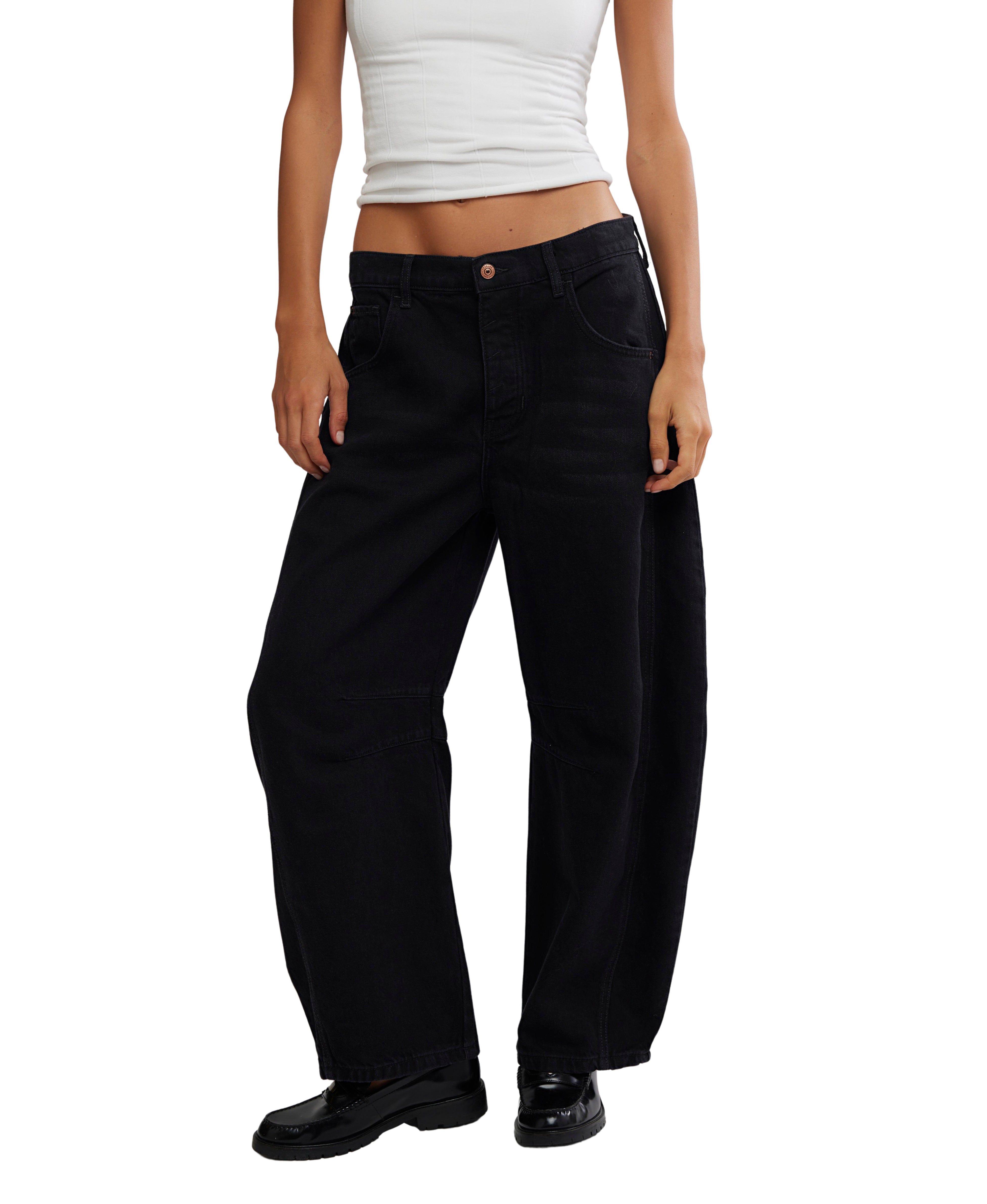 Free People Good Luck Black Barrel Denim Jeans styled with a white top and black shoes by Free People.