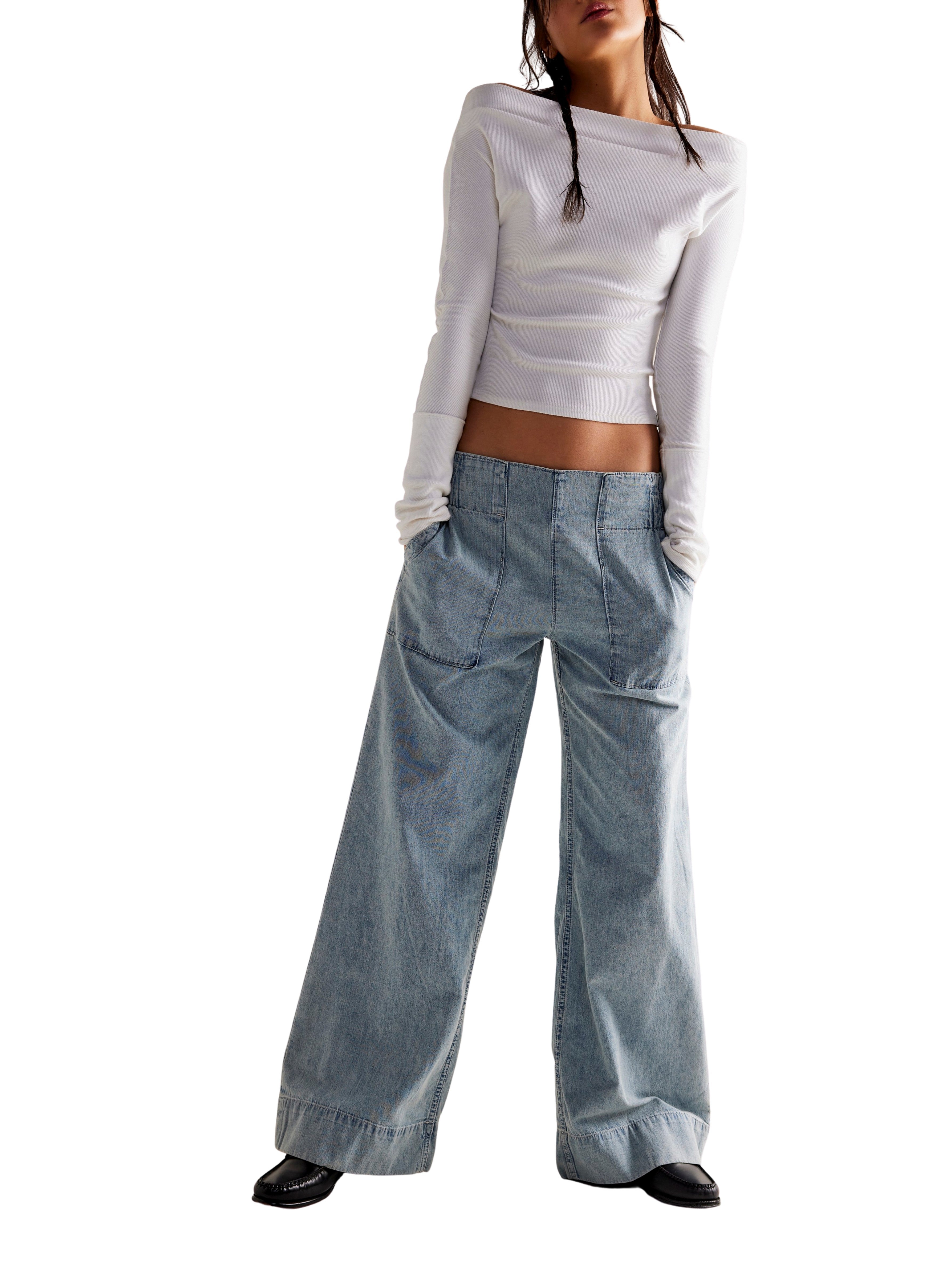 Free People Breezy Elastic Waist Pull-On Denim in light wash, featuring wide-leg design and elastic waistband by Free People.