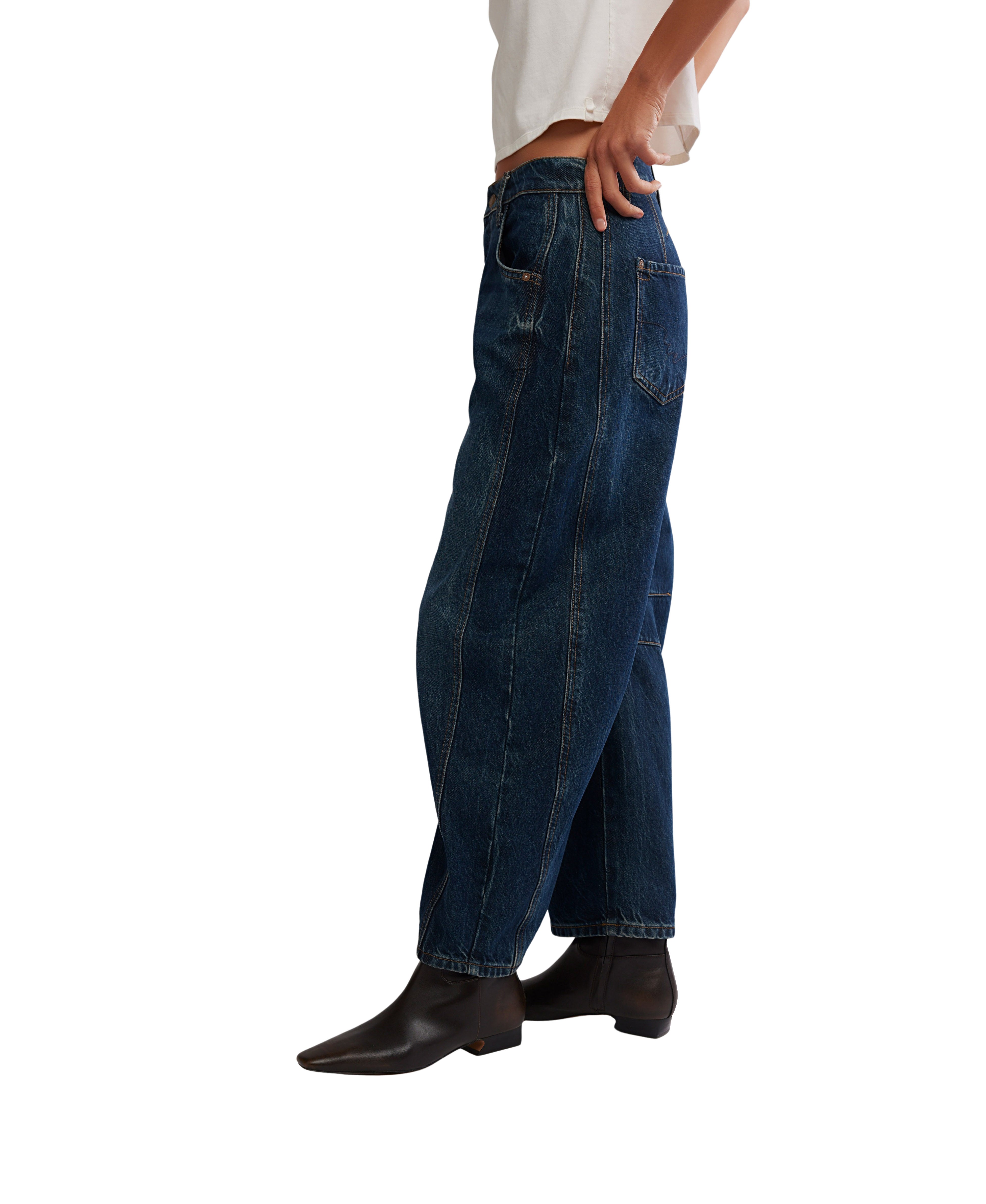 Free People Good Luck Maker Barrel Jeans in dark denim styled with black ankle boots by Free People.