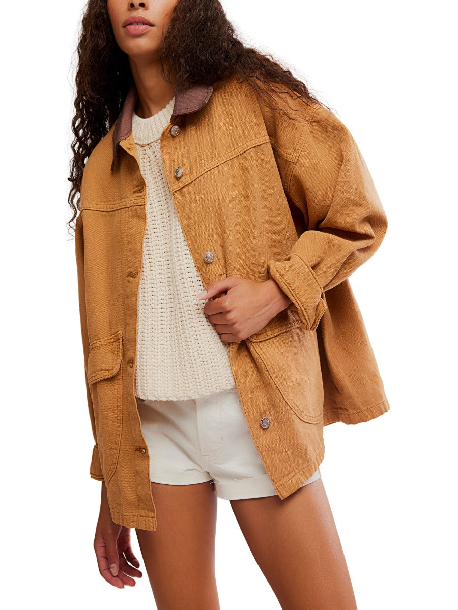 Casual look featuring Free People Lemon Meerkat Denim Jacket layered over a knit sweater and shorts by Free People.