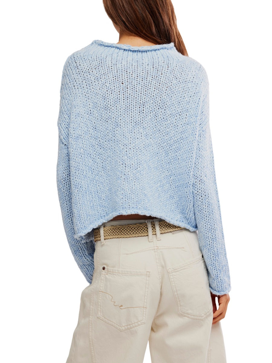 Free People Opal Reverse Seam Crewneck in light blue knit sweater, styled with beige pants from Free People.
