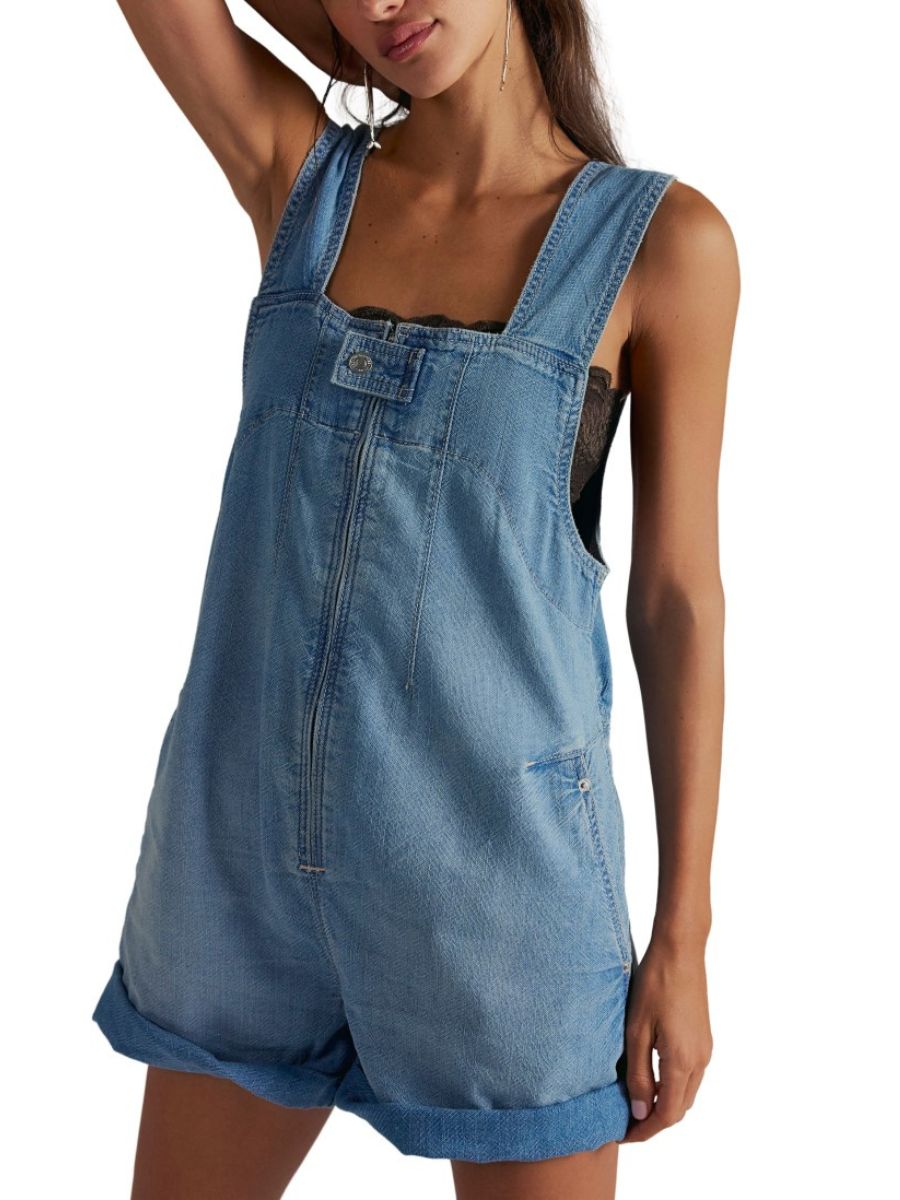 Free People Jude Zip Front Denim Shortall in light blue denim with rolled cuff shorts and front zipper detail by Free People.