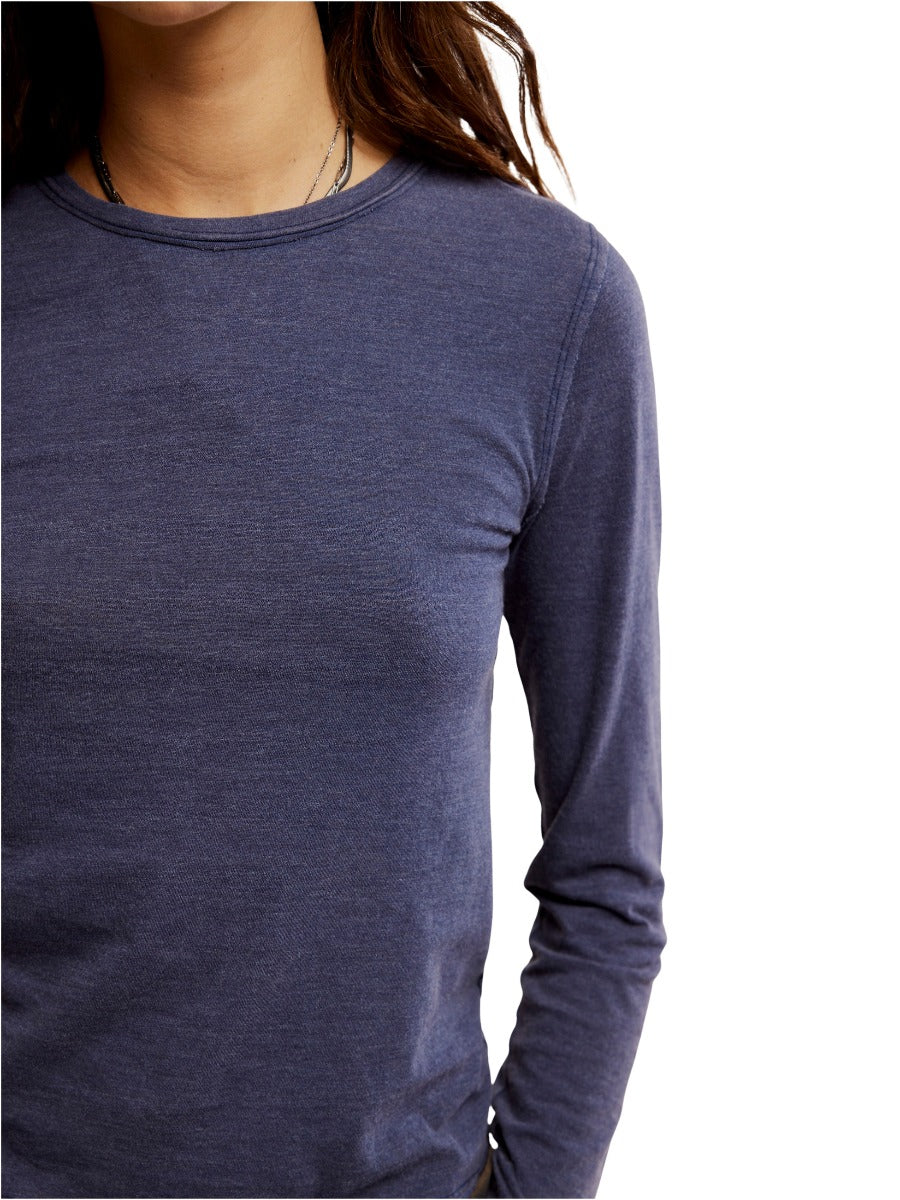 Free People Nova Long Sleeve Tee in navy blue, featuring soft fabric and a classic crew neckline by Free People.