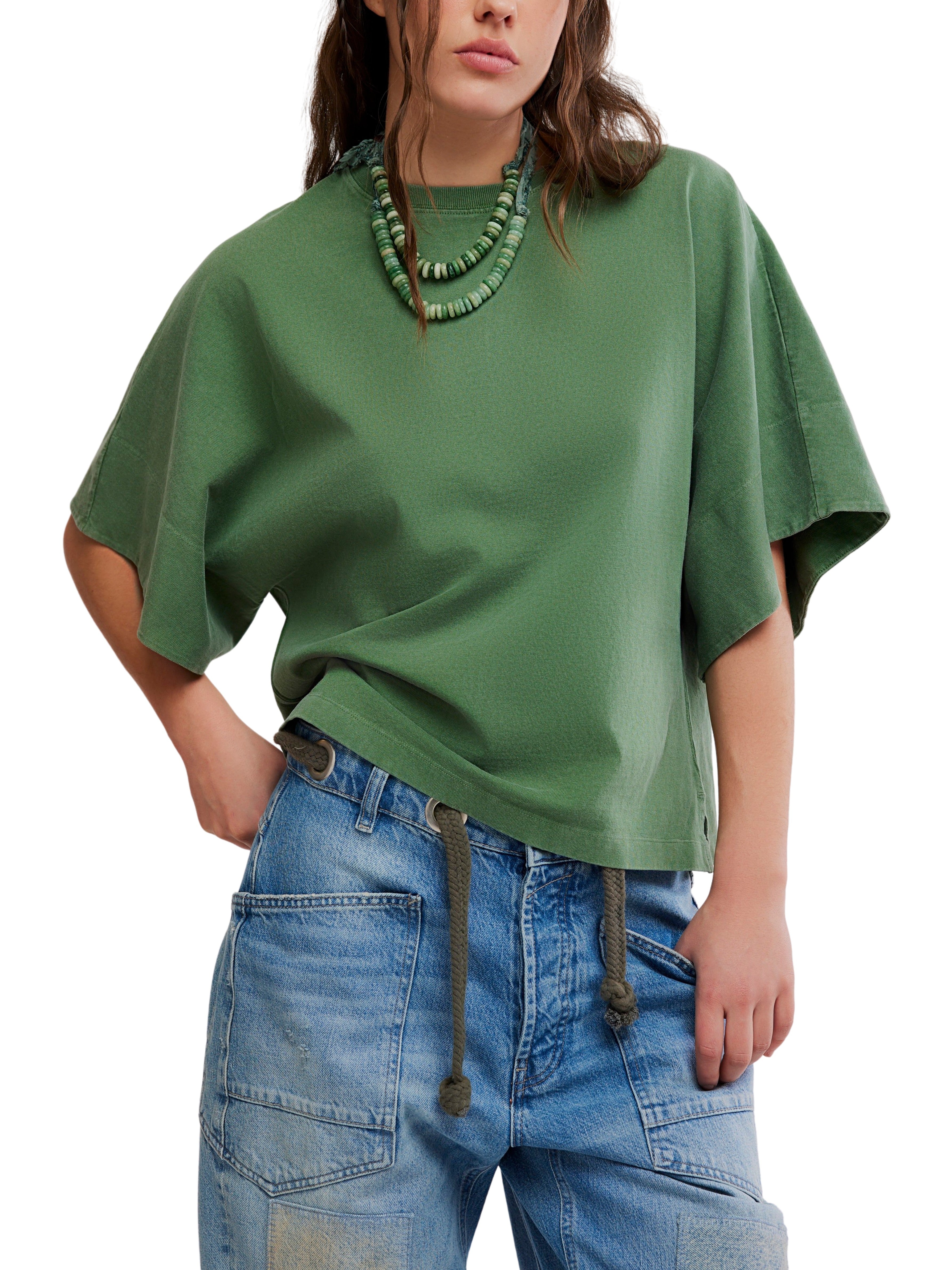 Free People Atlas Dolman Crew Top in green styled with layered necklaces and casual denim pants by Free People.
