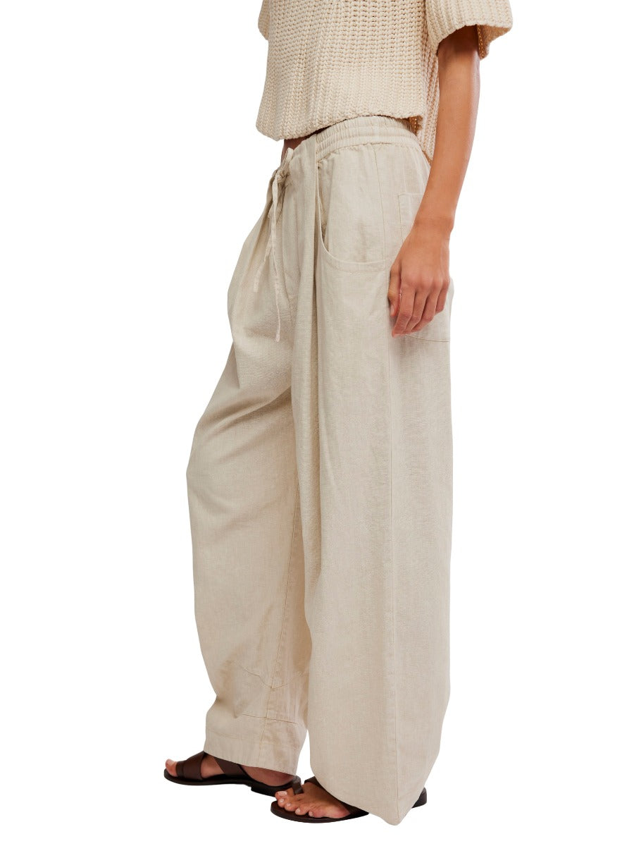 Free People Chambers Laid-Back Solid Pant in sand color with wide leg and drawstring waist by Free People.