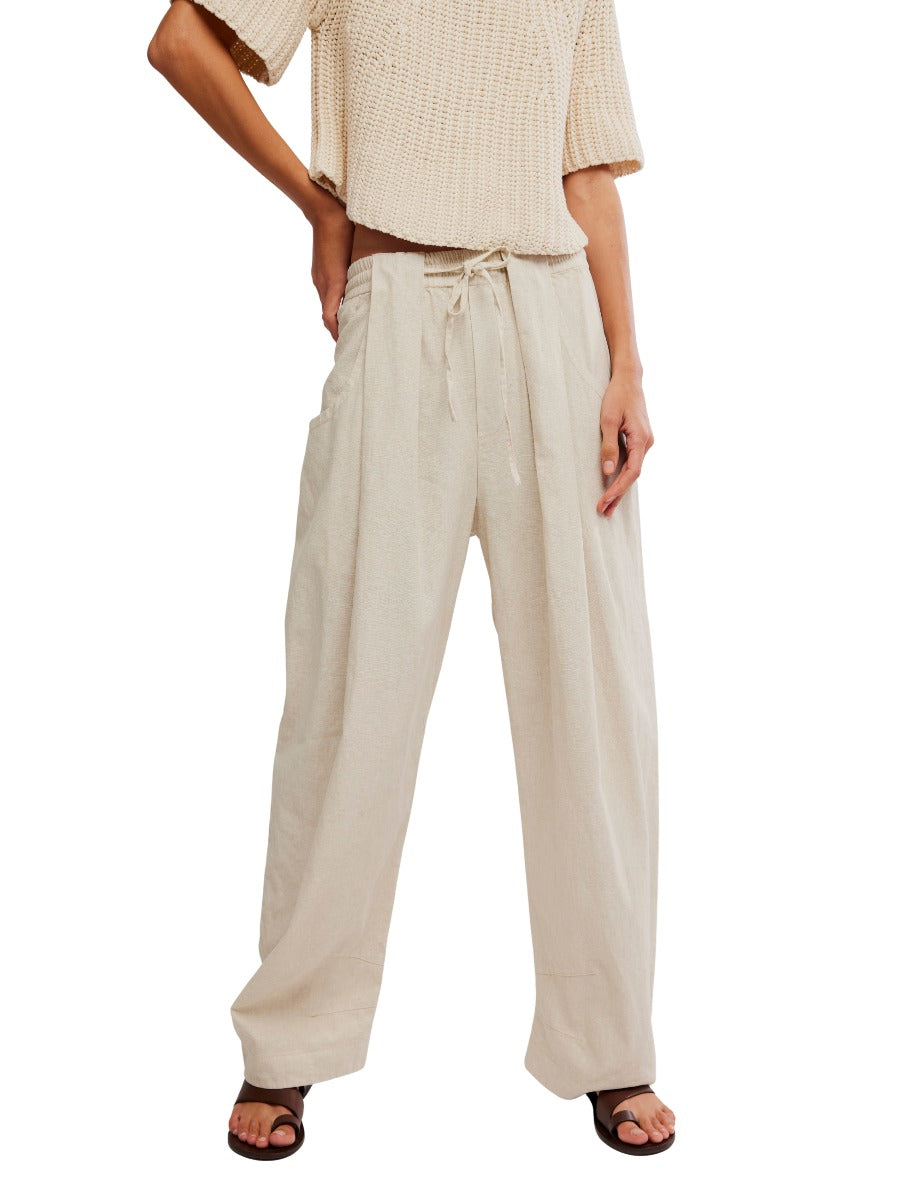 Free People Chambers Laid-Back Solid Pant in light beige with drawstring waist by Free People.