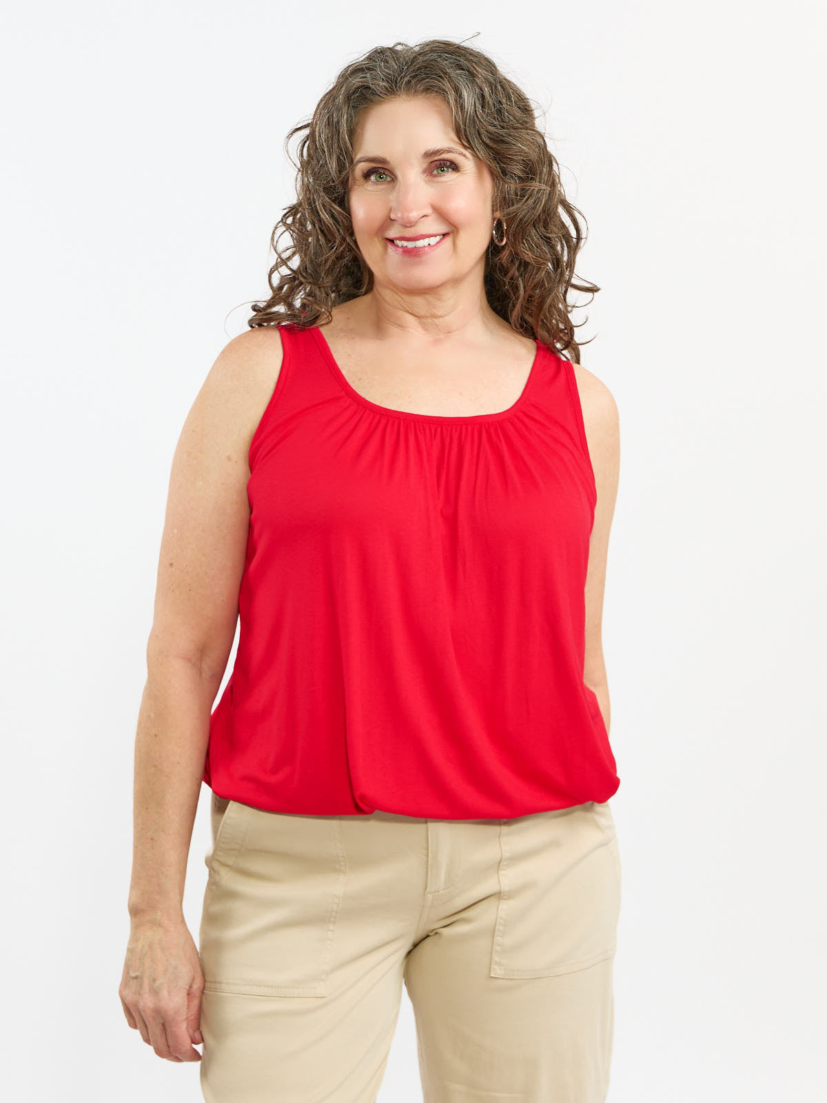 Miracle Bubble Hem Sleeveless Relaxed Fit Top in red by Plum Loco, featuring a relaxed fit with a bubble hem style.