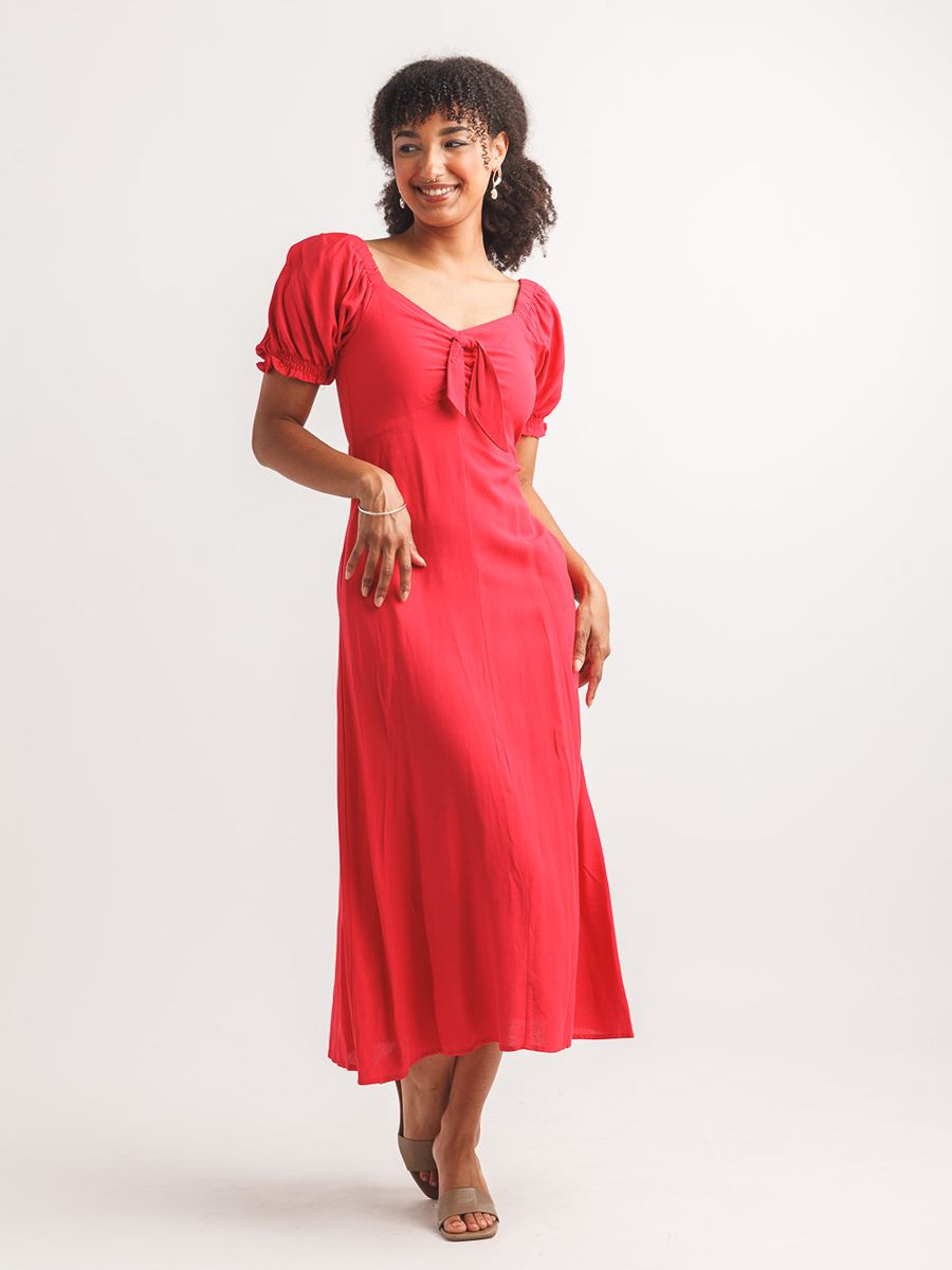 Papillon Bunny Tie Dress in vibrant red with puff sleeves and a front tie detail by Papillon