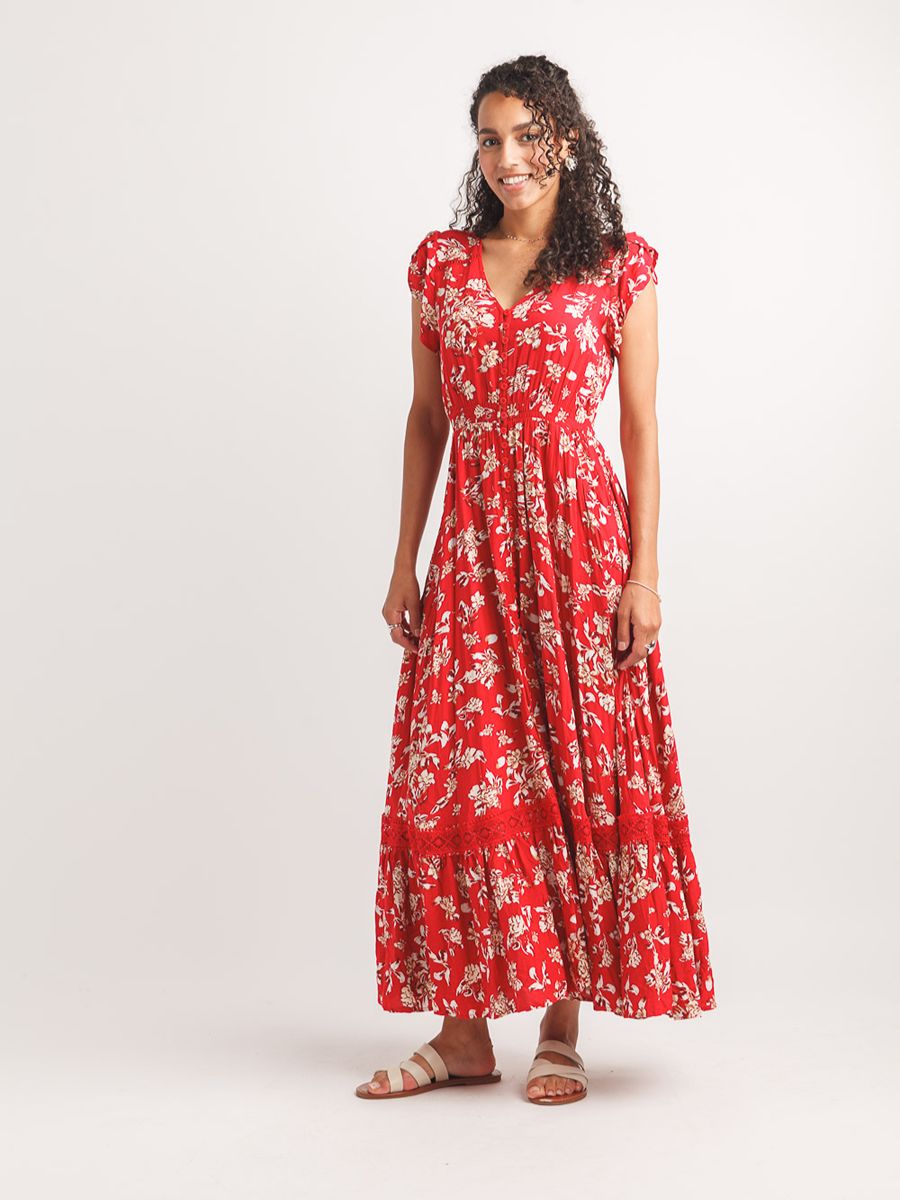 Papillon Floral Maxed Out Baby Button Maxi Dress in red with floral pattern and button details on a relaxed fit model.