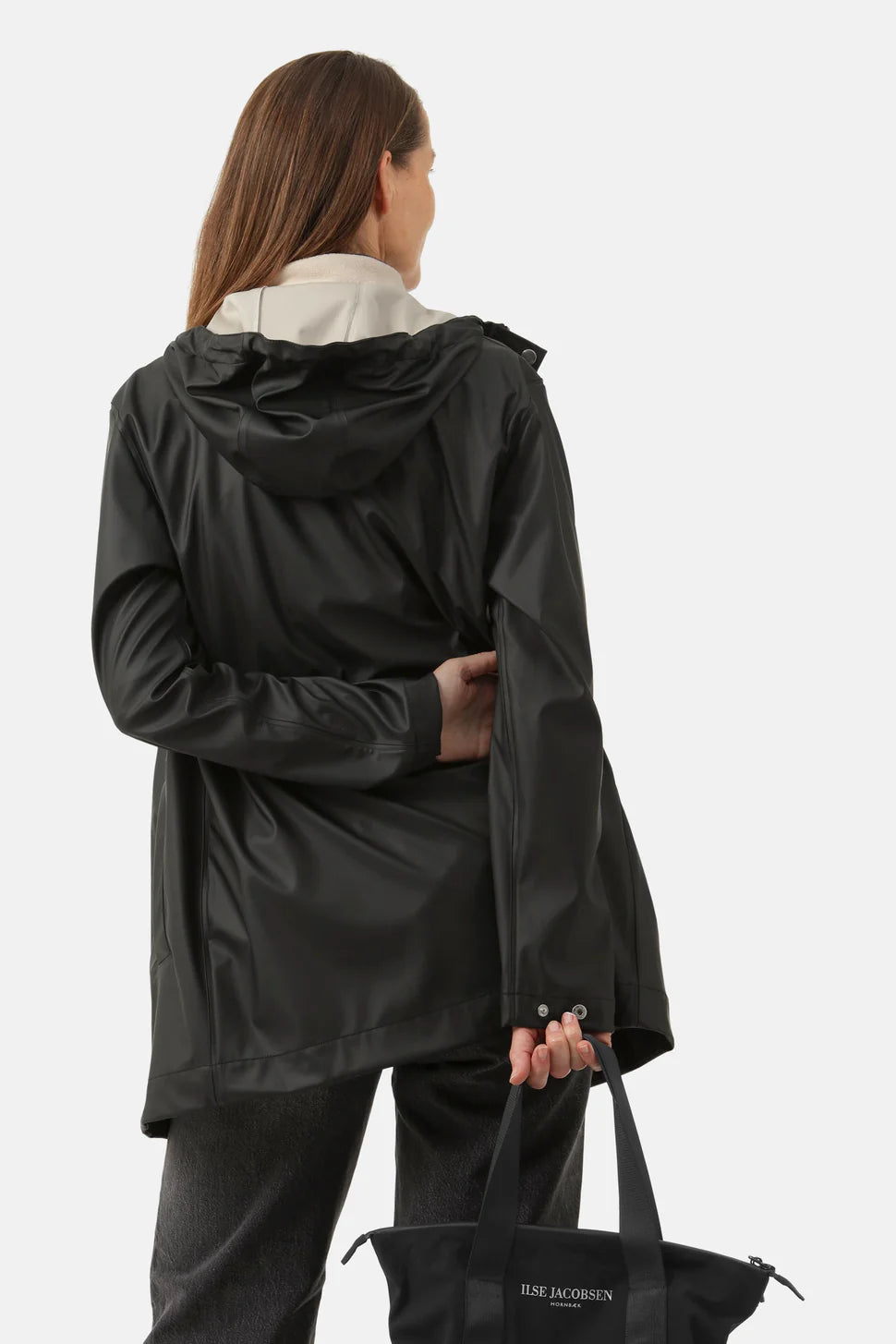 Ilse Jacobsen Rainy Days Waterproof Hooded Jacket in black styled with a matching black bag and casual pants