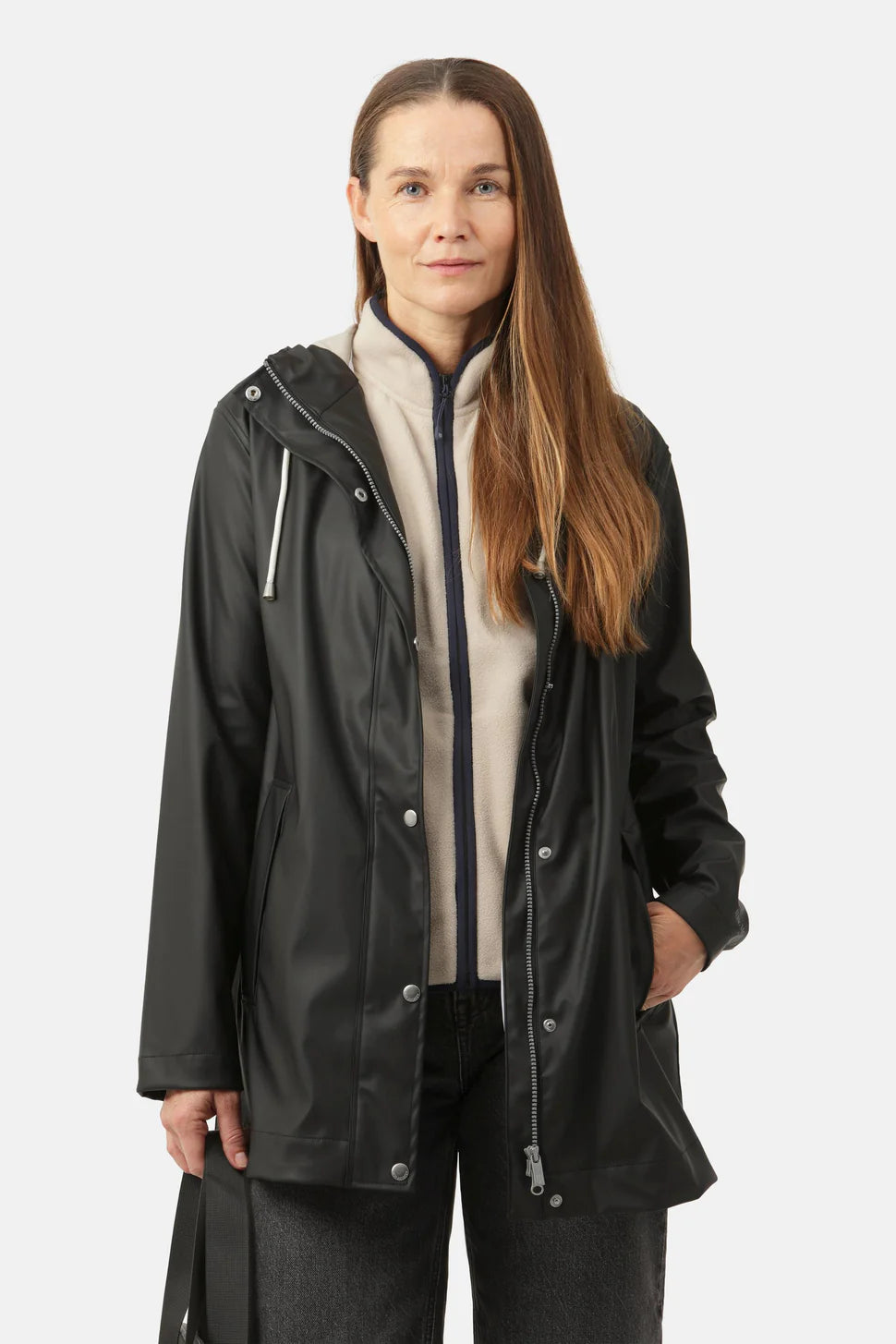 Ilse Jacobsen Rainy Days Waterproof Hooded Jacket in black, styled over a beige zip-up sweater, in casual outerwear look